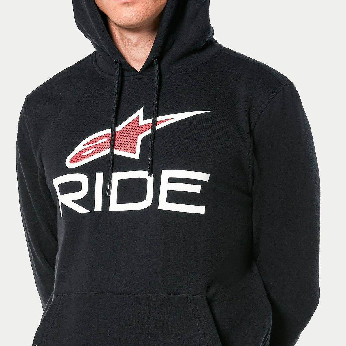 Alpinestars Ride 4.0 Hoodie, black pullover fleece, featuring white 'RIDE' text and red Alpinestars logo with perforated print on chest, casual motorsport streetwear with drawstring hood