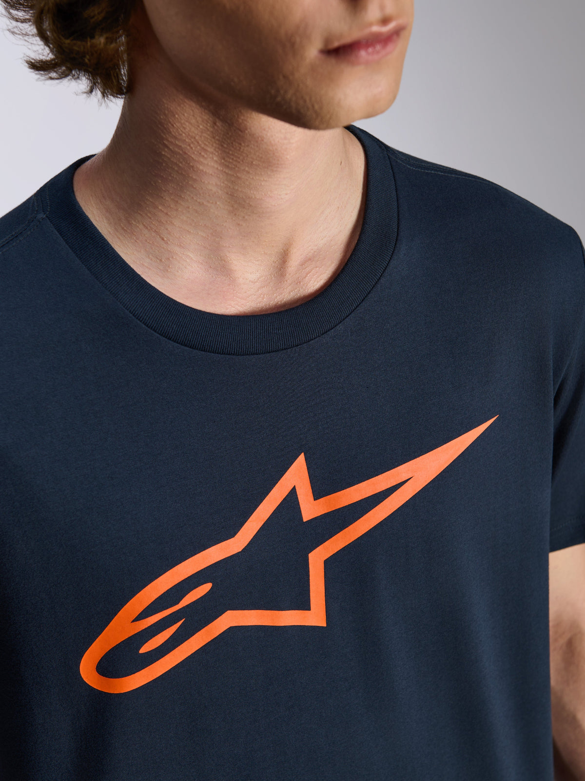 Alpinestars Ageless 2.0 CSF Tee, Short Sleeve T-Shirt, Navy Blue with Orange Alpinestars Logo, Casual Motorsport Streetwear