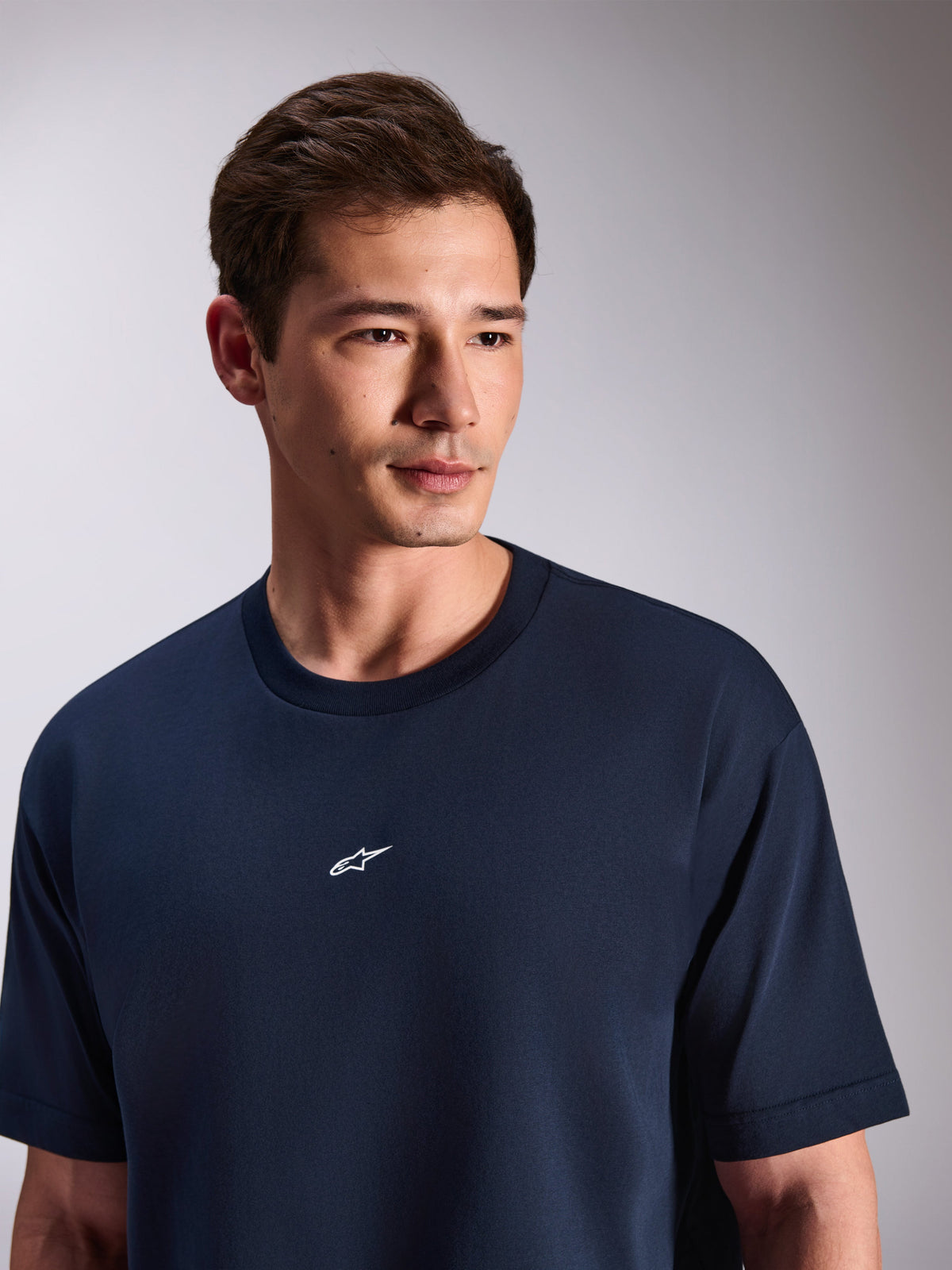 Alpinestars Focused Oversized CSF Tee, Short Sleeve T-Shirt, Navy Blue, featuring a small white Astars logo on the center chest, casual motorsport-inspired streetwear