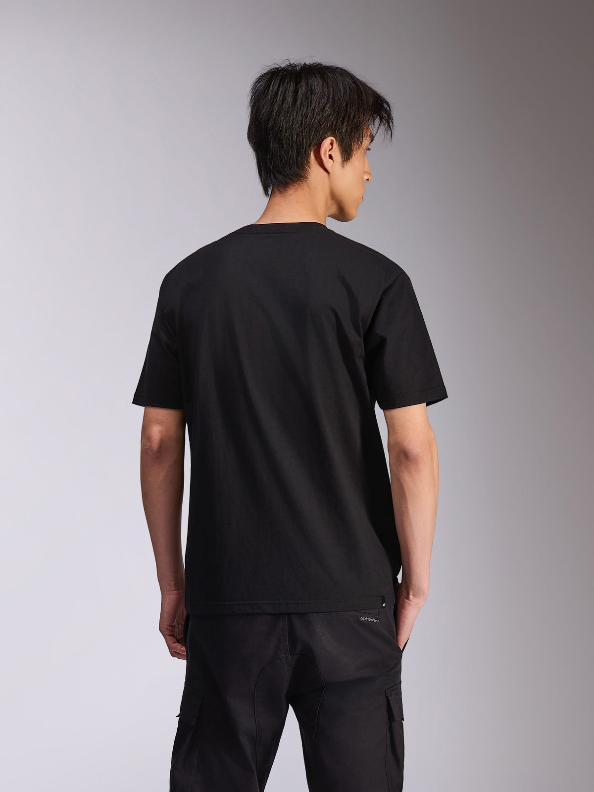 Alpinestars Alter Oversized CSF Tee, Short Sleeve T-Shirt, Black, back view on model showing the oversized fit, casual motorsport-inspired streetwear