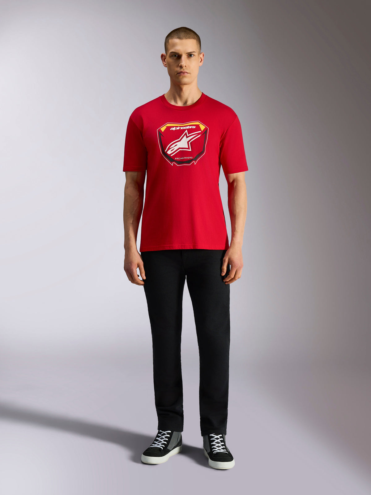 Alpinestars Plate CSF Tee, Short Sleeve T-Shirt, Red, Front MX Plate graphic with white star logo, worn with black pants and sneakers, casual motorsport streetwear