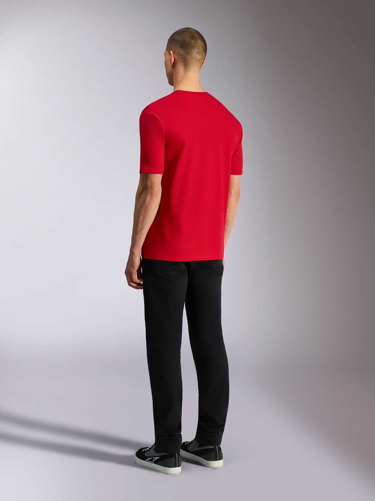 Alpinestars Plate CSF Tee, Short Sleeve T-Shirt, Red, Back View, worn with black pants and sneakers, casual motorsport-inspired streetwear