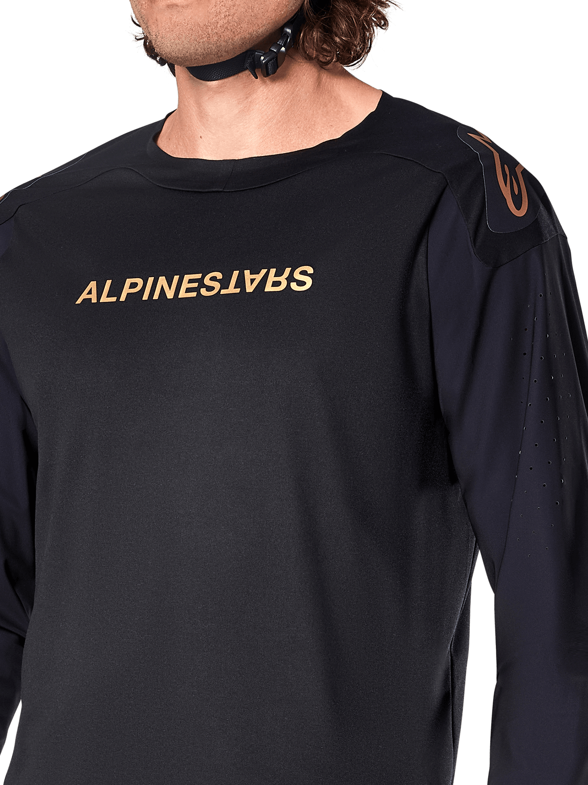 Alpinestars A-Aria Polartec Switch Langarmtrikot, Schwarz, mit bronzefarbenem Alpinestars-Branding auf der Brust und der Schulter, Laserperforationen an den Ärmeln zur Belüftung, technische Performance-MTB-Bekleidung