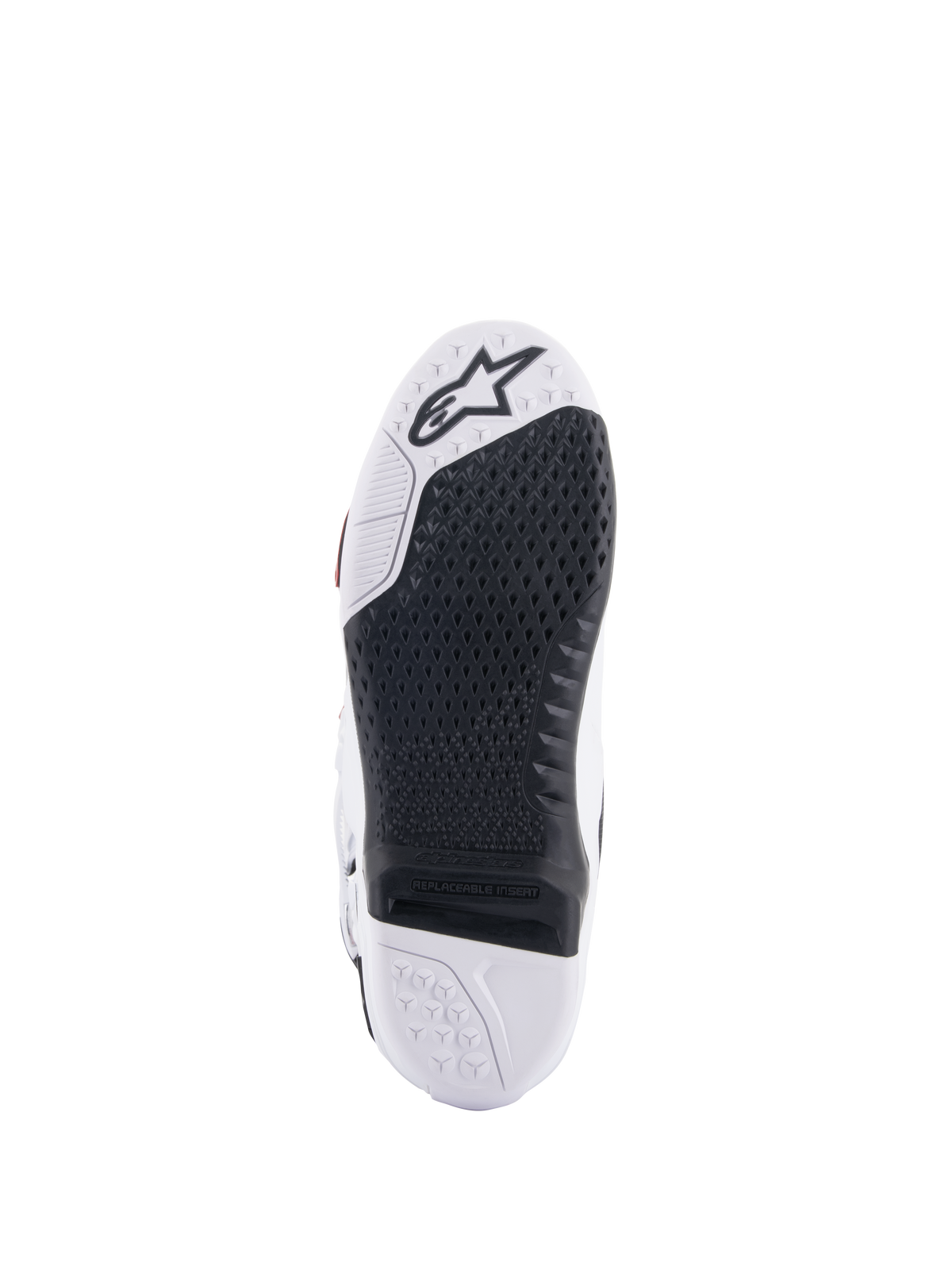 Alpinestars Tech 10 Supervented Boots, White and Black sole view, featuring an extended honeycomb grip design, black replaceable central insert, white toe with Alpinestars star logo, optimized for motocross footpeg control.
