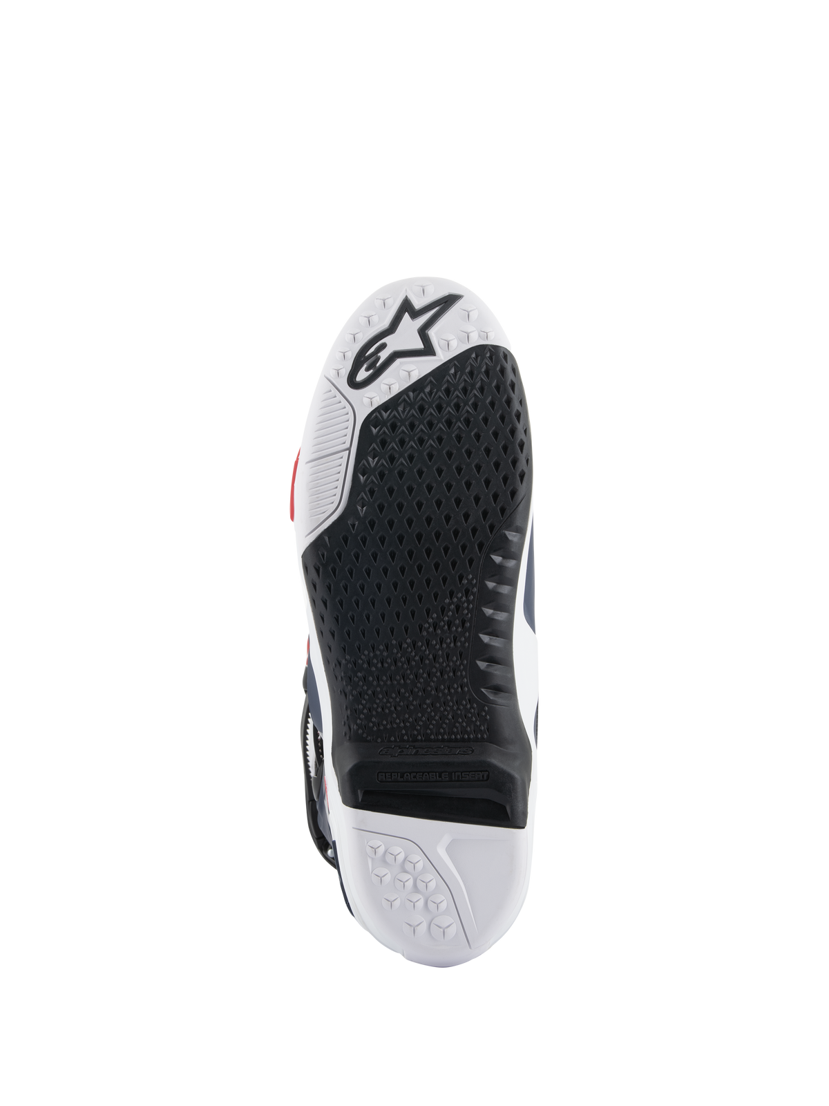 Alpinestars Tech 10 Supervented Stiefelsohle, Unteransicht mit schwarz-weißem Dual-Compound-Design, Wabenstruktur für Grip, austauschbarem zentralem Einsatz und geprägtem Alpinestars-Logo, optimiert für Motocross-Fußrasten-Performance.