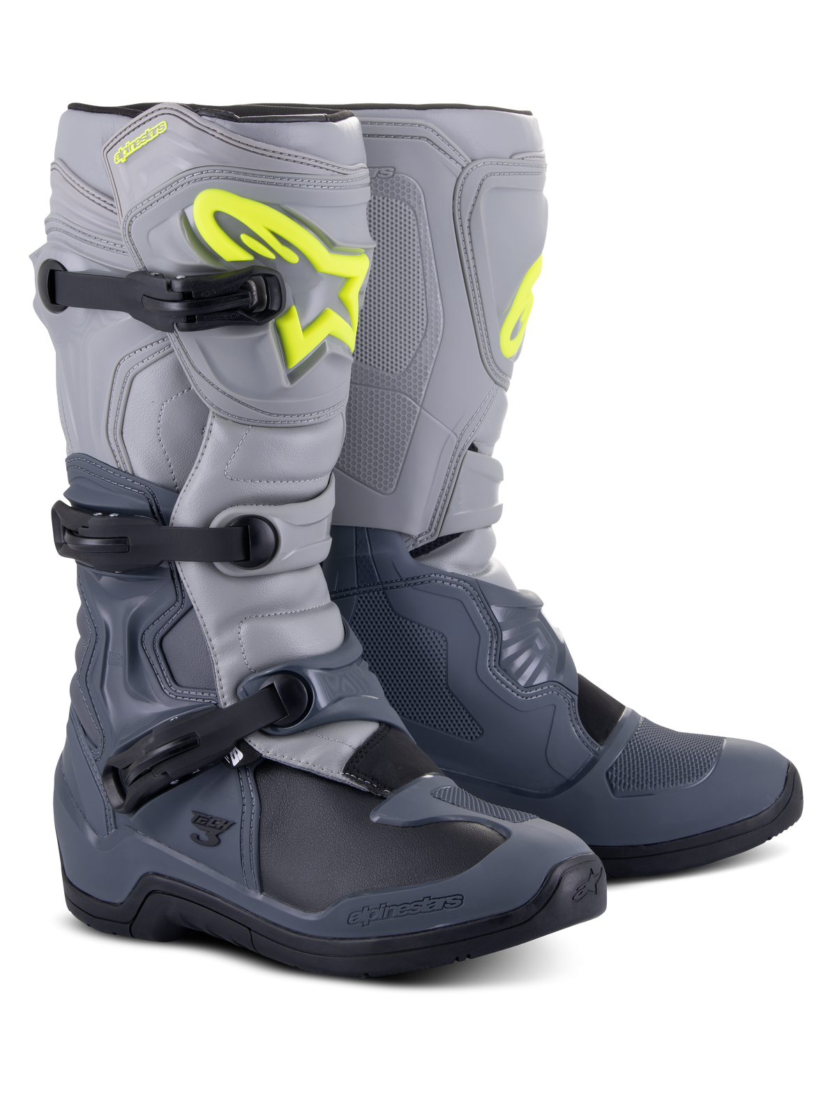 Alpinestars Tech 3 Stiefel, Motocross-Stiefel, Dunkelgrau, Hellgrau und Schwarz, mit markantem neongelbem Alpinestars-Logo, Drei-Schnallen-Verschlusssystem und verstärkten Schutzpaneelen für Offroad-Performance.