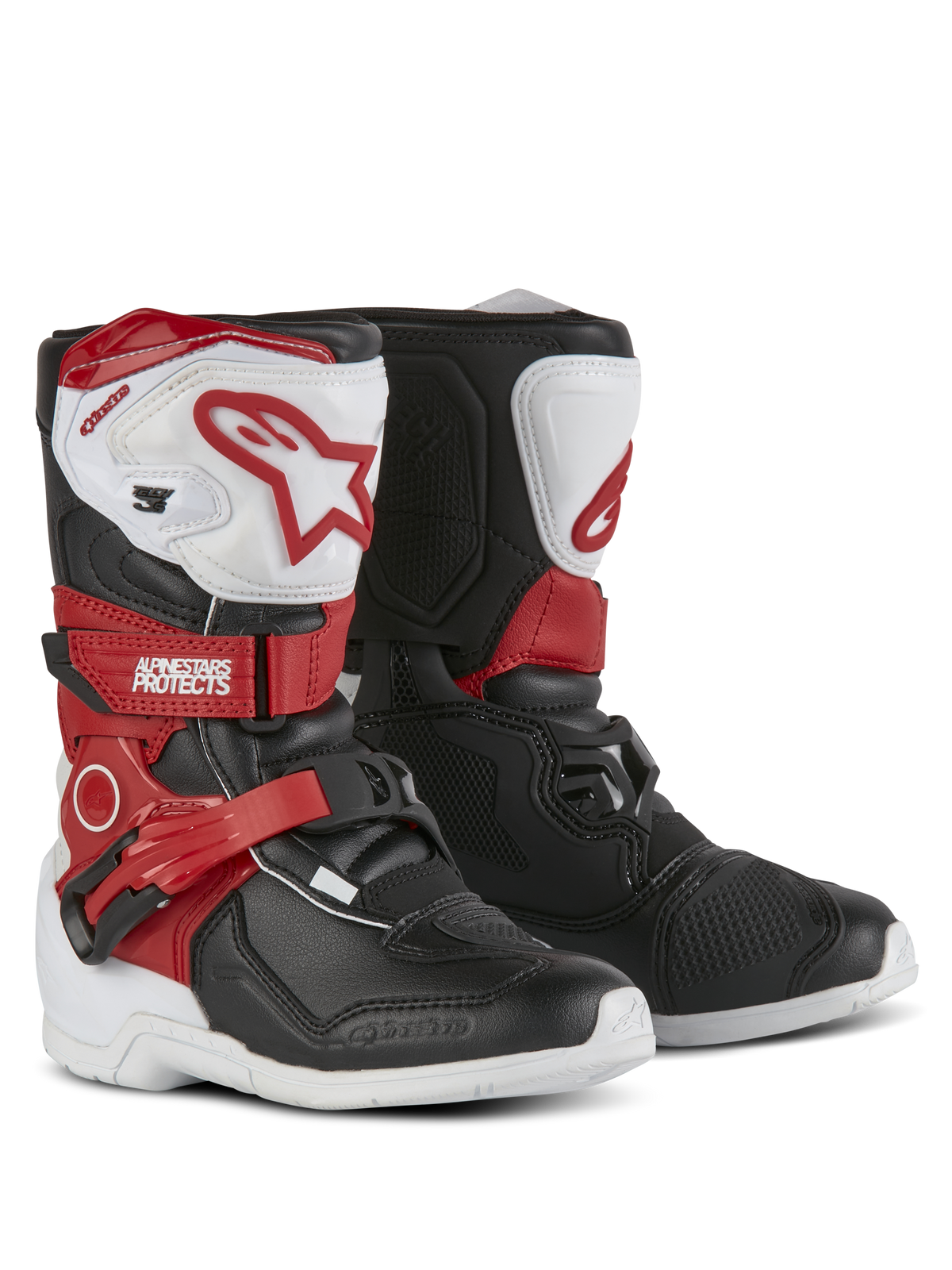 Alpinestars Kids Tech 3S Stiefel, Motocross-Stiefel, Weiß, Schwarz und Hellrot, mit schützenden TPU-Schienbeinplatten, roten Riemen mit Alpinestars-Branding, Schnallenverschluss und strapazierfähigen weißen Außensohlen.