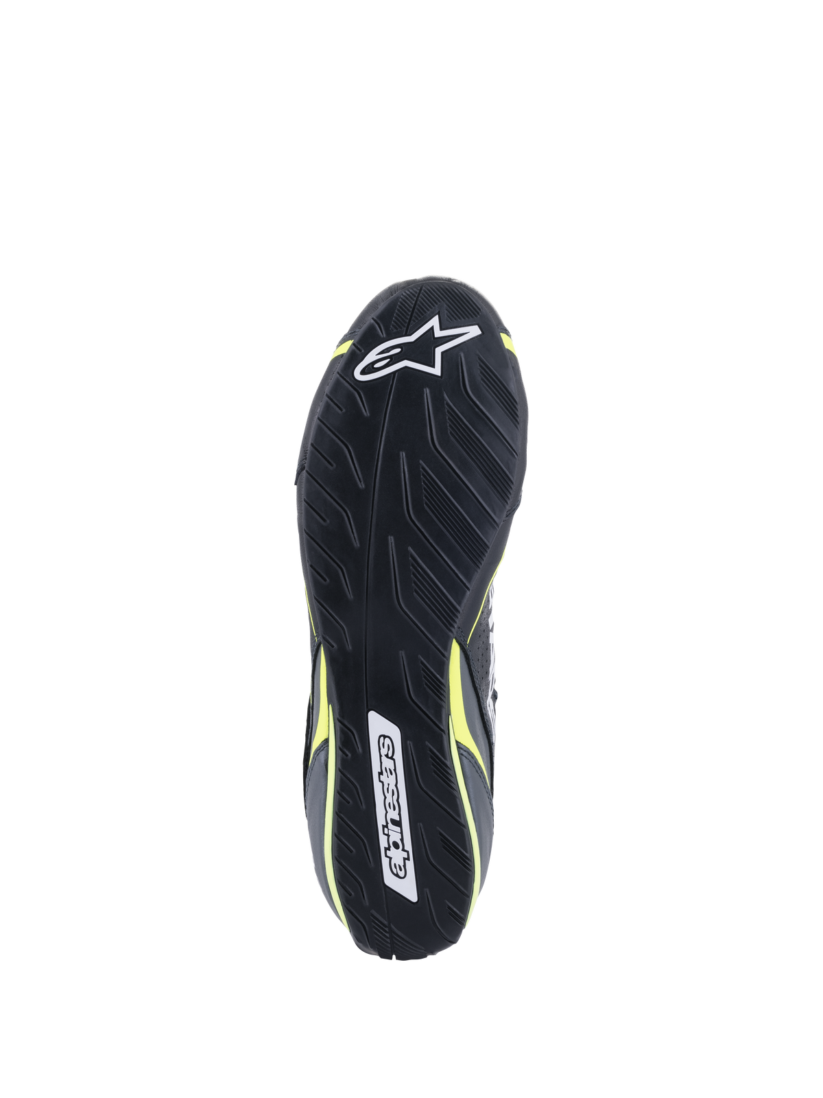 Alpinestars Tech-1 T V3 Schuhe FIA, Ansicht der Außensohle, Schwarz mit gelb fluoreszierenden Akzenten, asymmetrische Gummisohle mit Reifenprofil-Inspiration, mit Alpinestars-Logos und strukturierter Oberfläche für Pedalsensibilität und Grip.