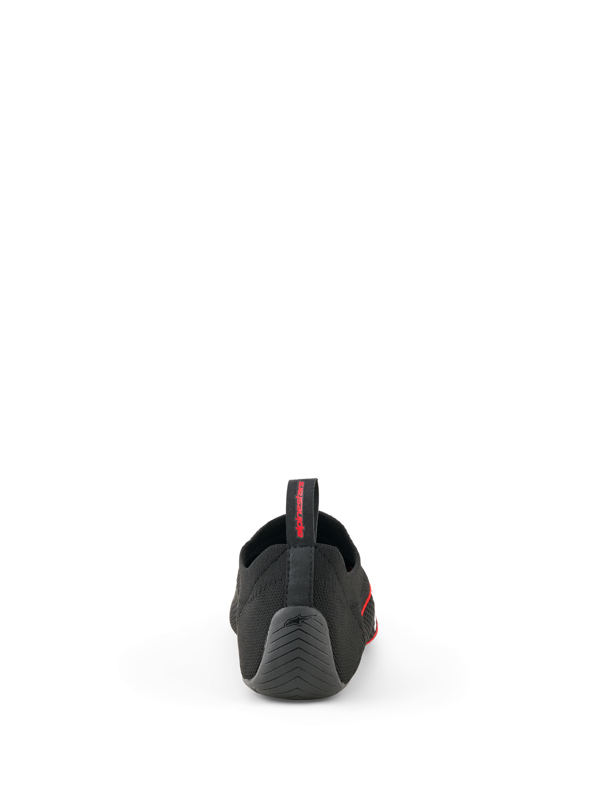 Alpinestars Tech Gaming-Schuhe, Schwarz, Rückansicht mit nahtlosem, gestricktem Obermaterial, strukturierter Gummiferse mit Stern-Logo und hinterer Zuglasche mit rotem Branding, SIM-Racing-Schuhe