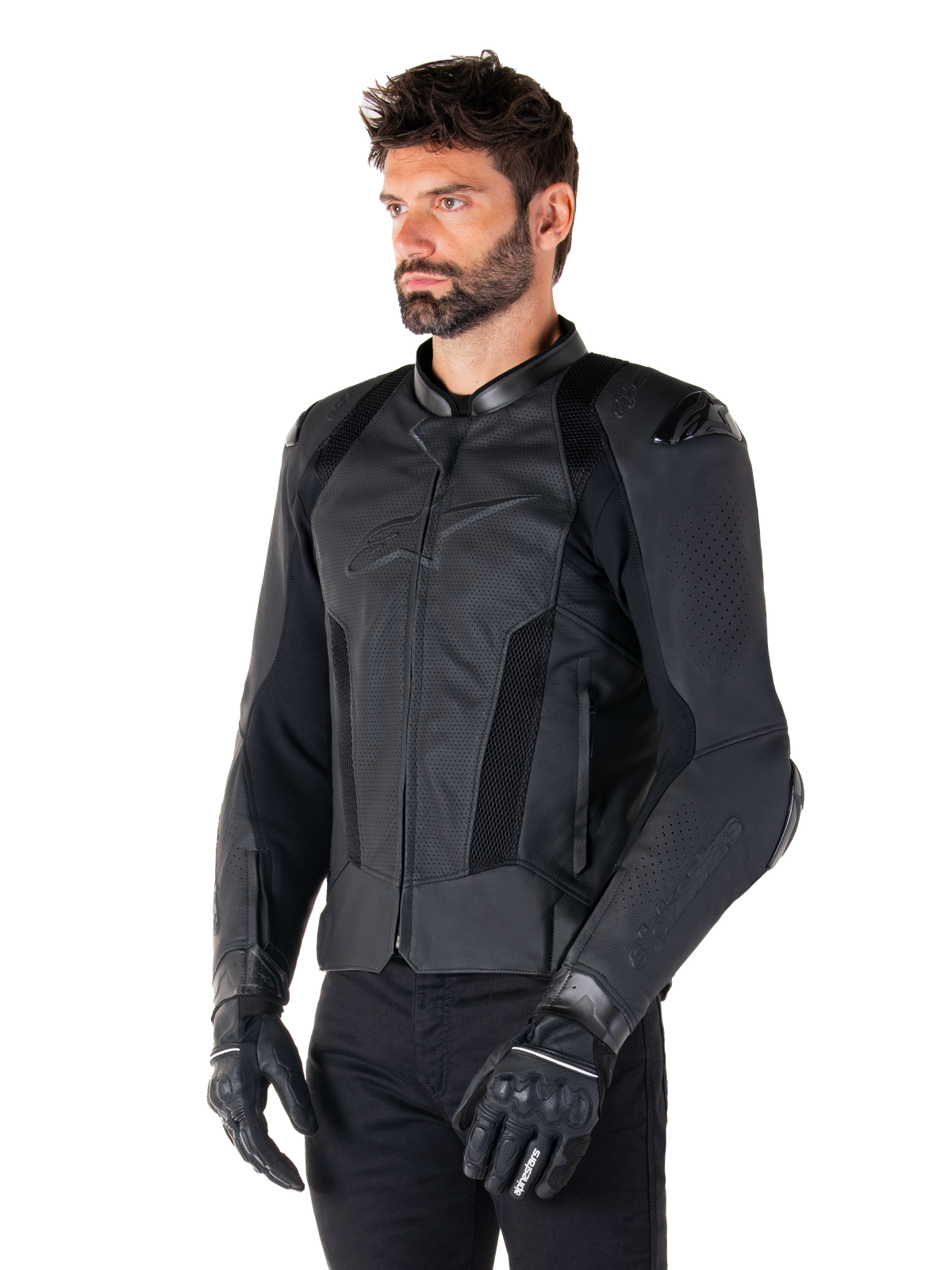 Alpinestars Missile V3 Airflow Lederjacke, Schwarz, getragen von einem Mann mit schwarzen Motorradhandschuhen und -hosen, mit umfangreichen perforierten Ledereinsätzen, DFS-Schulterprotektoren und sportlichem Race-Fit-Design.