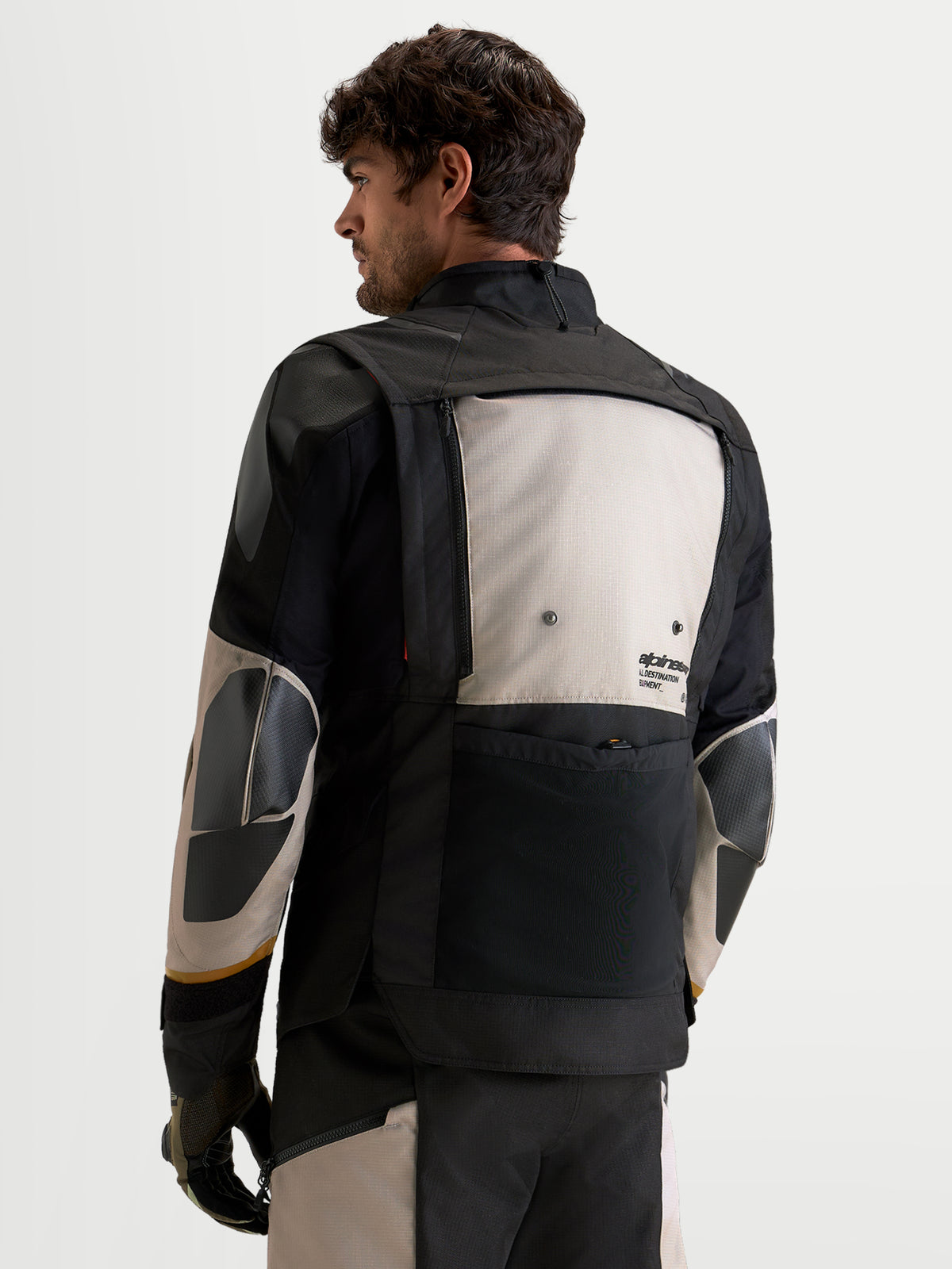 Alpinestars Harok V2 Drystar Jacket, Men's Adventure Motorcycle Jacket, Aluminum, Walnut, and Black, rear view showing modular ventilation panels and durable textile construction