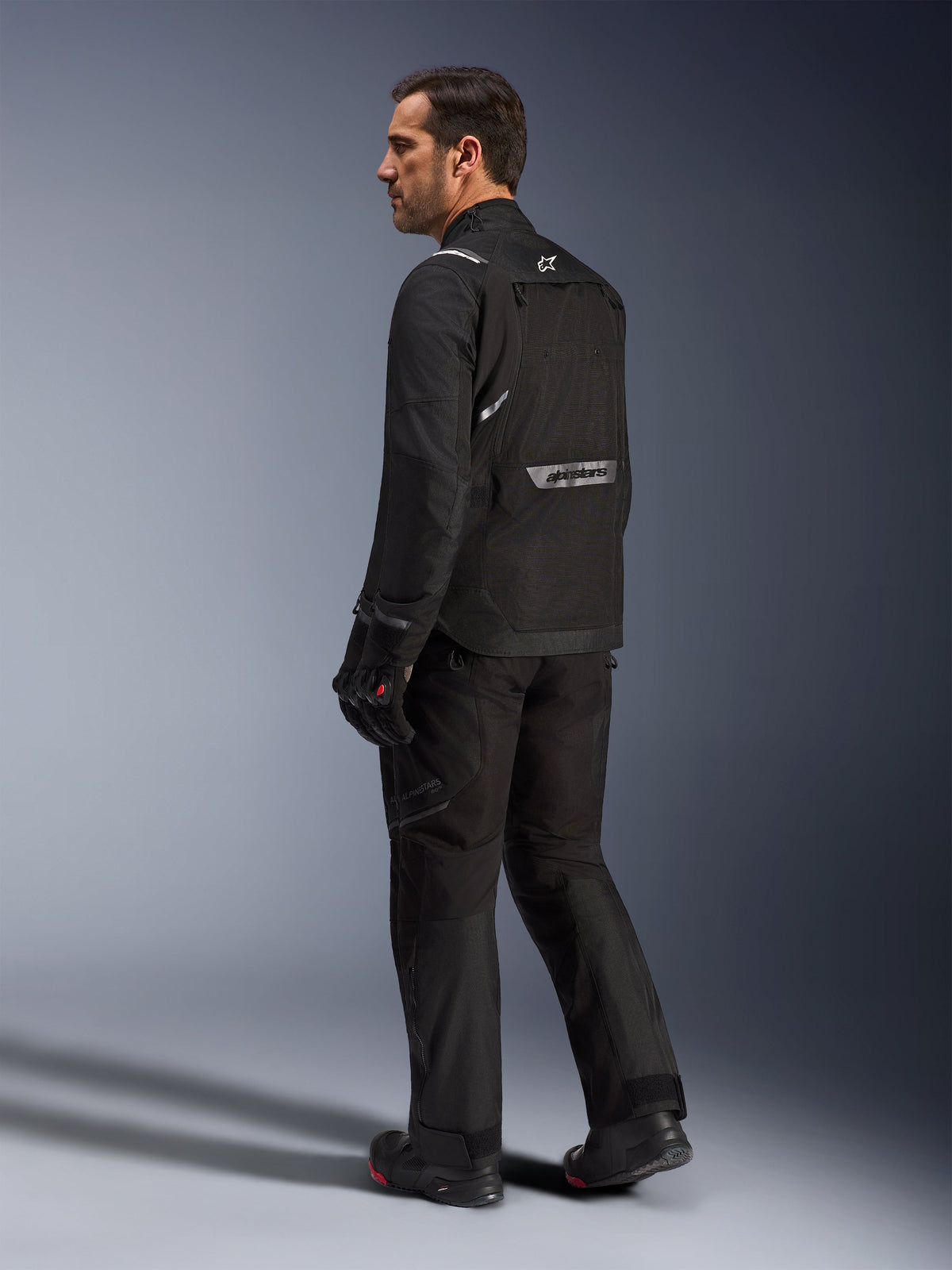 Alpinestars Cusco Drystar® Jacket, black textile adventure touring motorcycle jacket with reflective back branding.