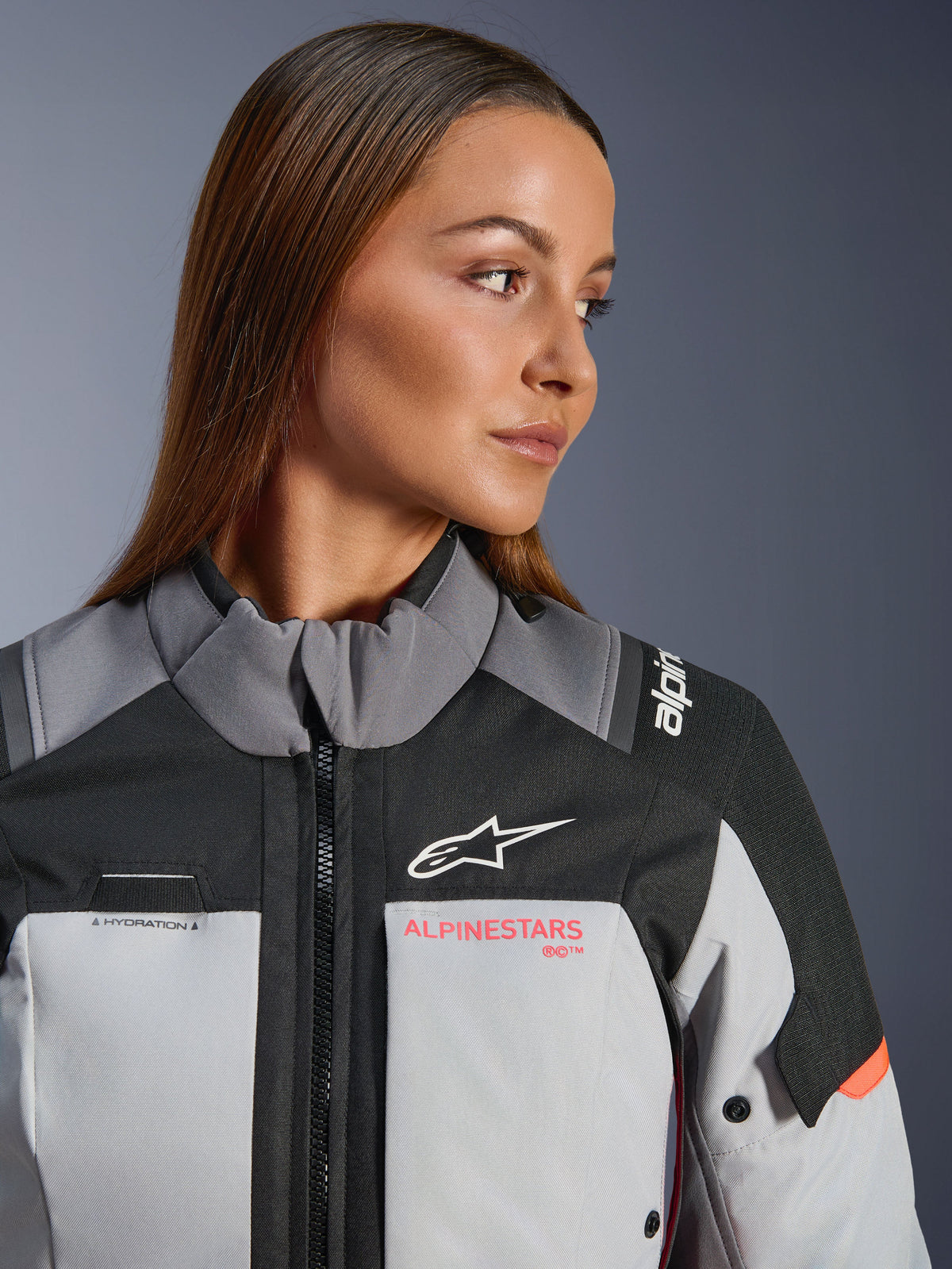 Alpinestars Stella Andes V4 Drystar® Women's Jacket in Gray and Coral Fluo features technical adventure textile.