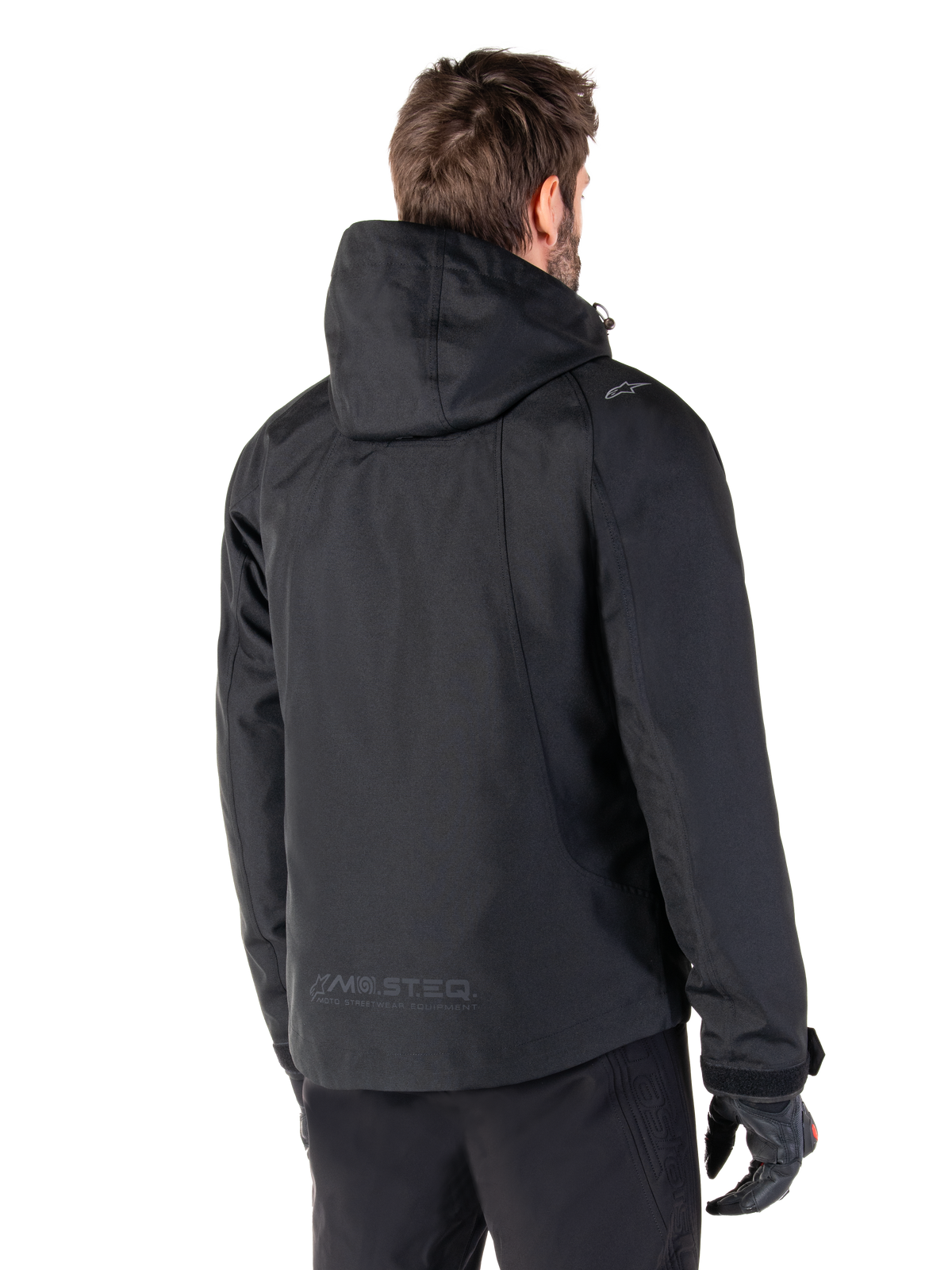 Alpinestars Morush Wasserdicht Parka, Herren-Motorradjacke in Schwarz, Rückansicht mit Kapuze und MO.ST.EQ.-Branding.