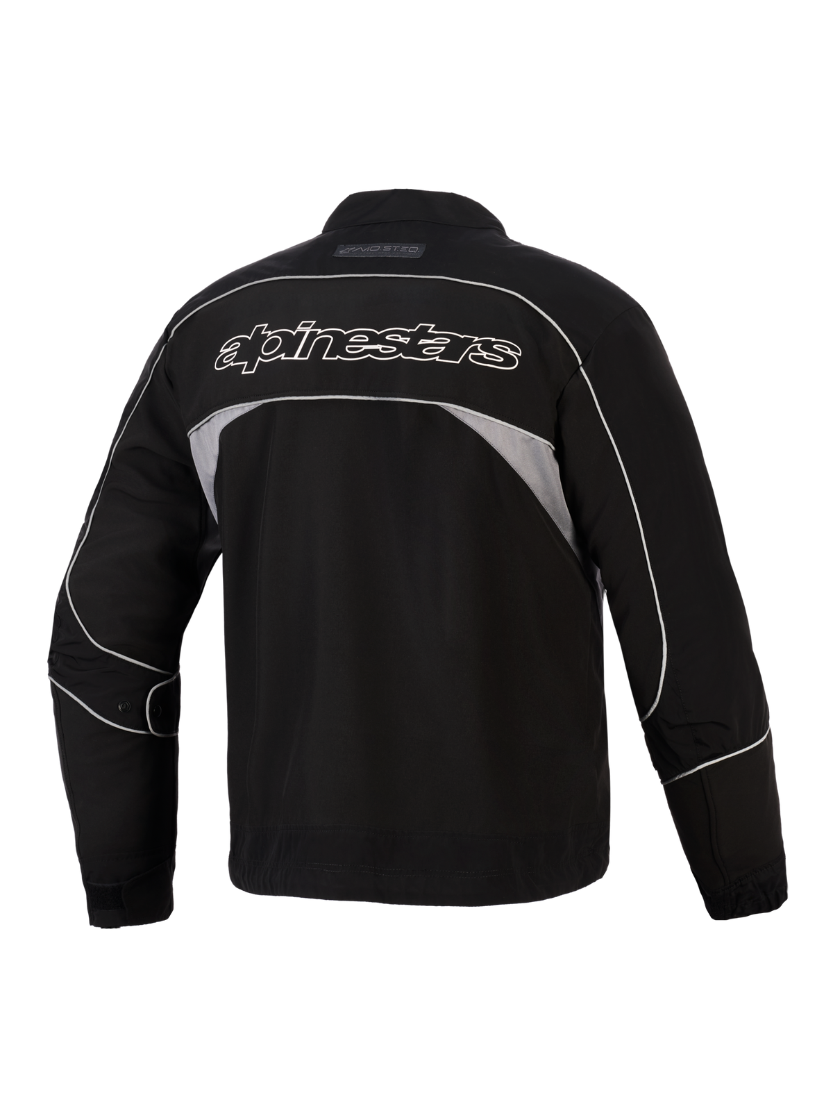 Alpinestars Unite Jacke, Rückansicht, Schwarz mit dunkelgrauen reflektierenden Einsätzen, weiß umrandeter Alpinestars-Schriftzug auf dem Rücken, urbane Motorrad-Softshelljacke mit minimalistischem Design