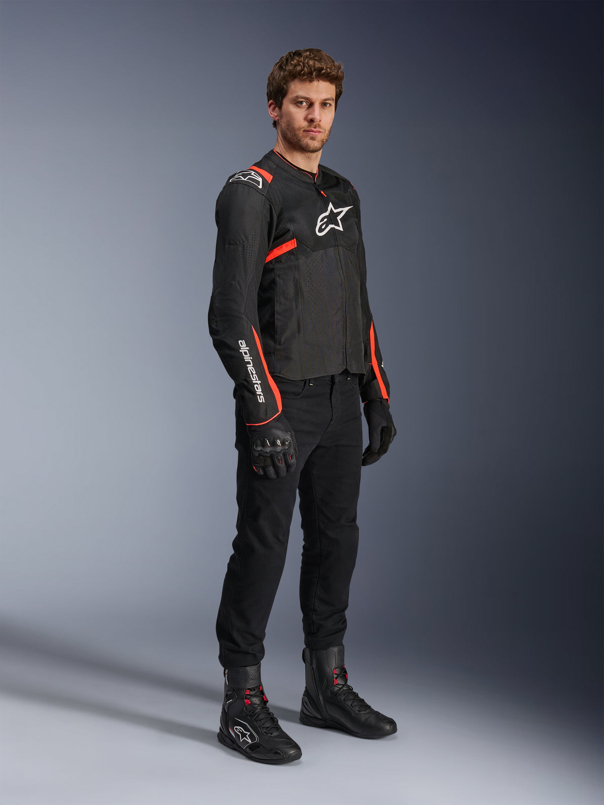 Alpinestars T-SPS Air V2 Jacke, Herren-Motorradjacke aus Textil in Schwarz und Rot Fluo mit belüfteten Mesh-Einsätzen.