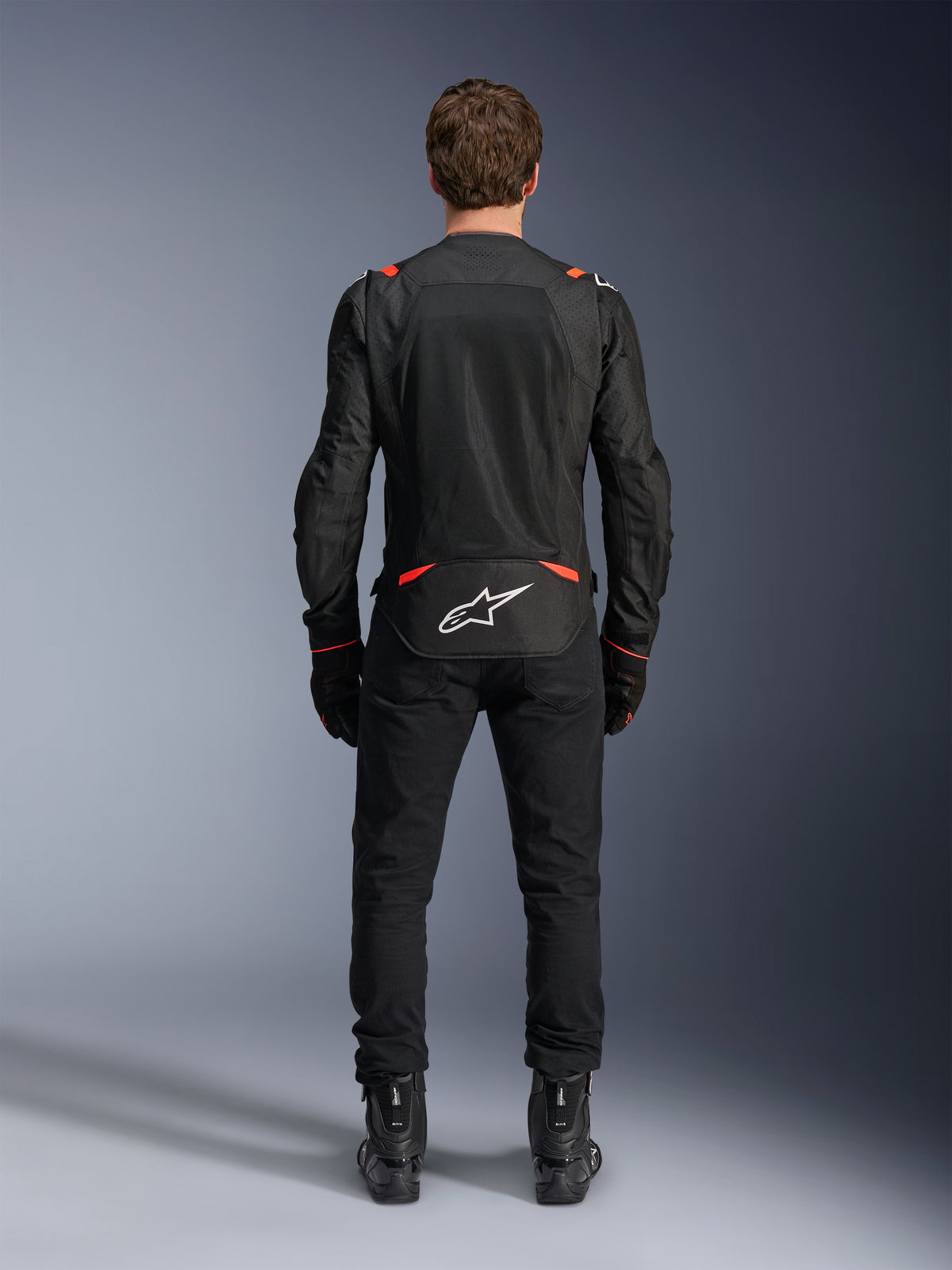 Alpinestars T-SPS Air V2 Jacke, Herren-Motorradjacke, Schwarz und Rot Fluo, Rückansicht mit Textil-Mesh-Einsätzen.