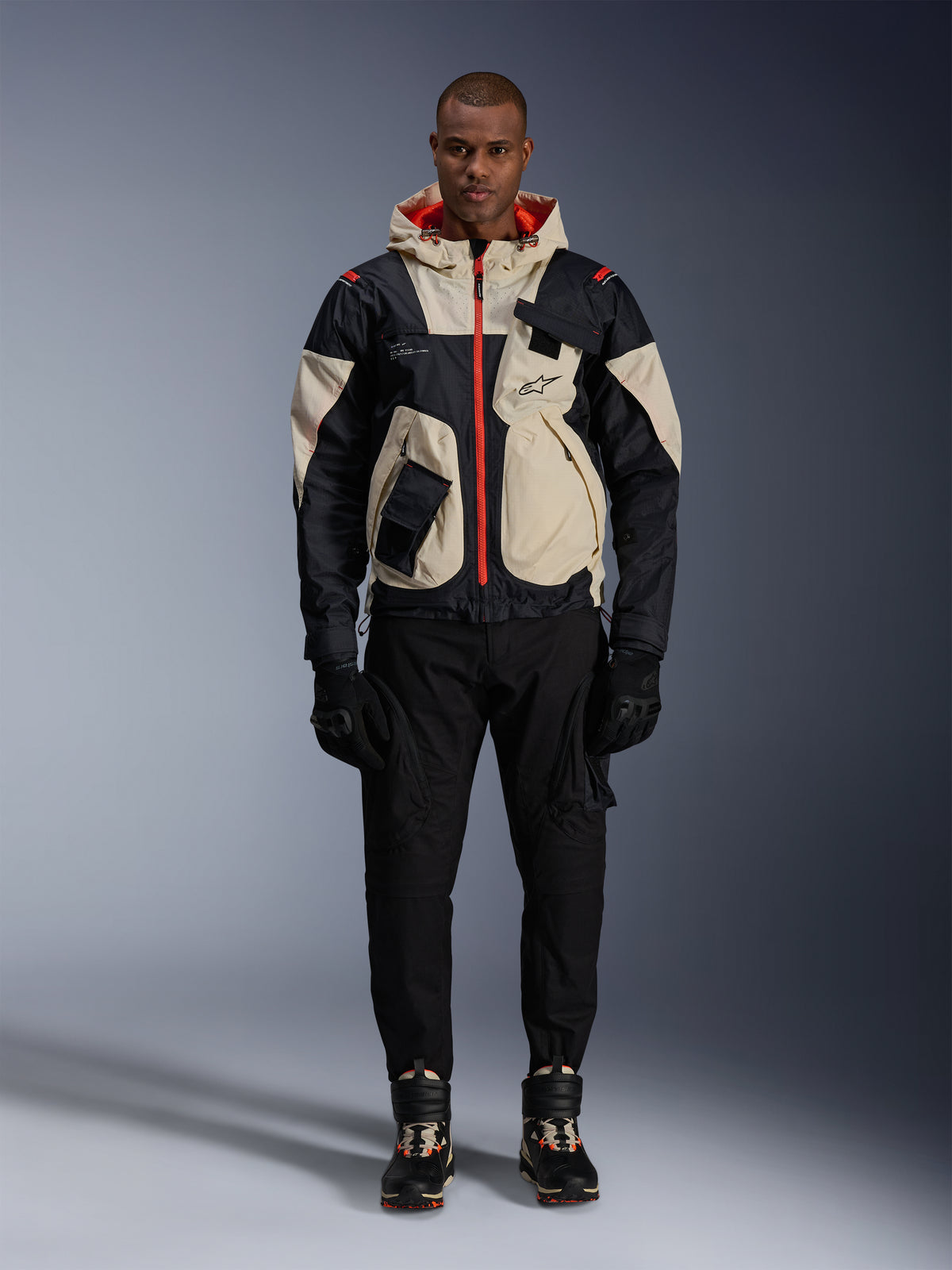 Alpinestars Mogress Air Jacket, men's urban textile motorcycle jacket in black and almond with hot orange accents.