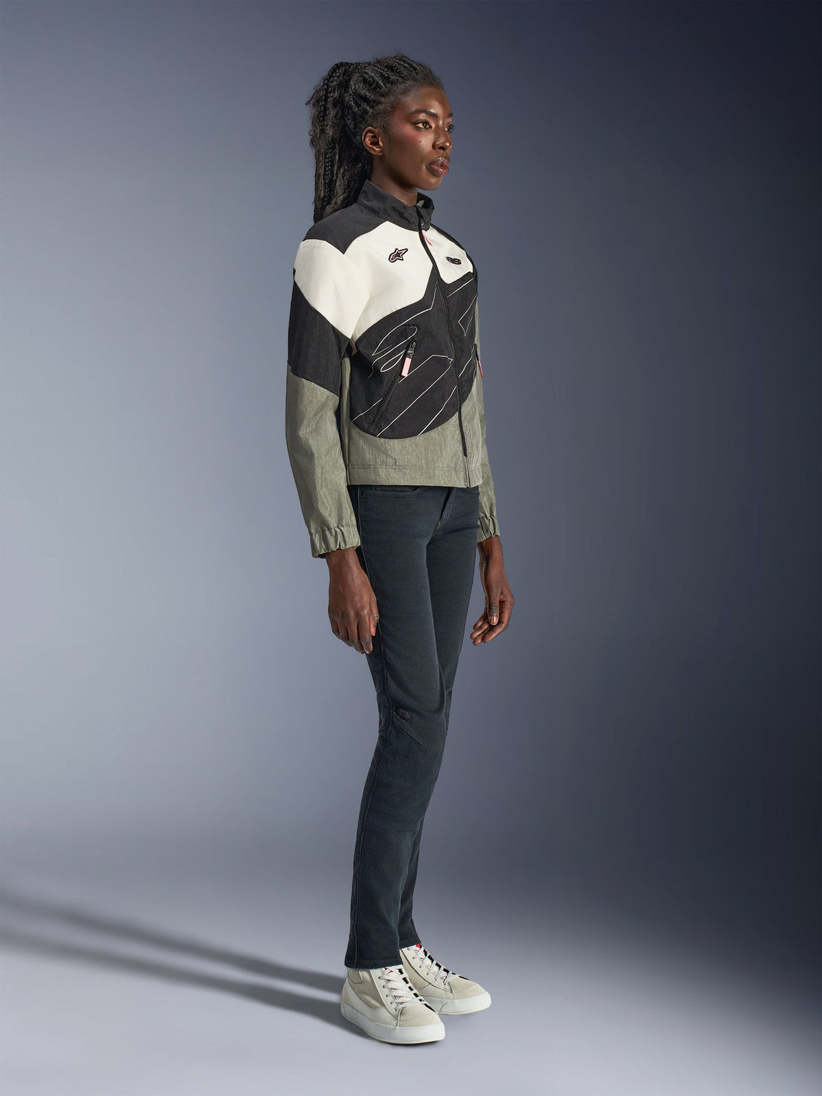 Alpinestars Stella Moshell Jacket, windproof gray and black recycled polyamide urban riding jacket for women on a model.