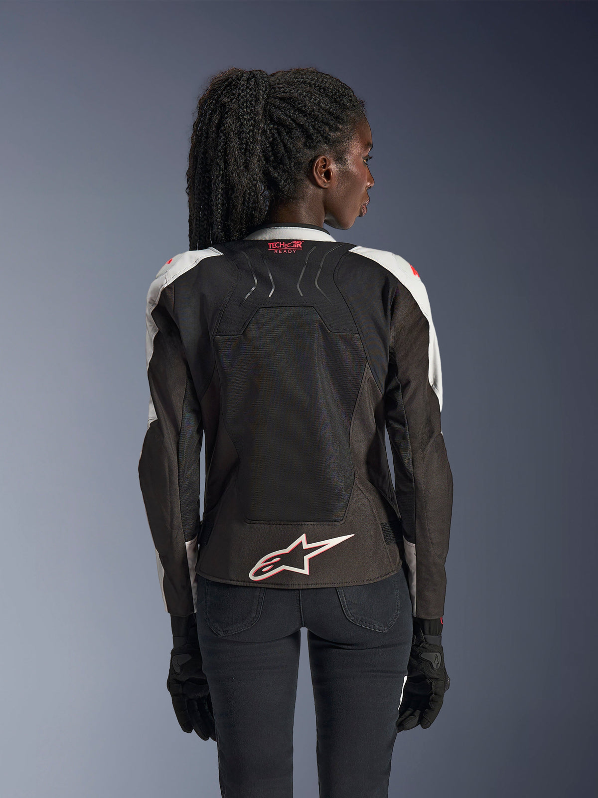 Alpinestars Stella SMX Air Jacket, Women's Motorcycle Jacket, Ice Gray and Black with Coral Fluo accents, back view showing Tech-Air Ready branding and white Astar logo, mesh chassis for high ventilation, sport-style fit