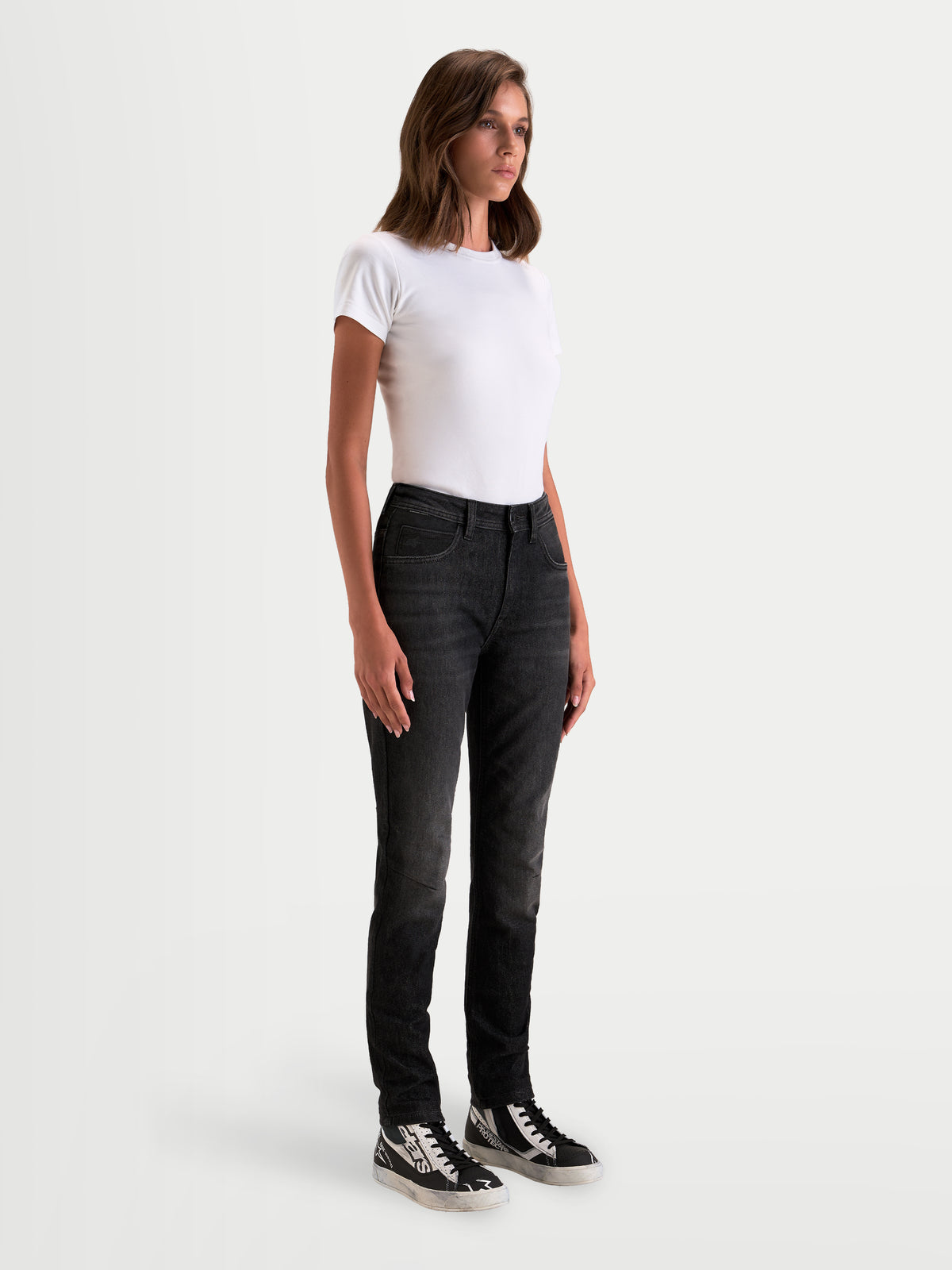 Alpinestars Stella Flex-AST 5 Denim Pants Short, women's urban contemporary motorcycle jeans in black washed finish, side-front view worn by a model