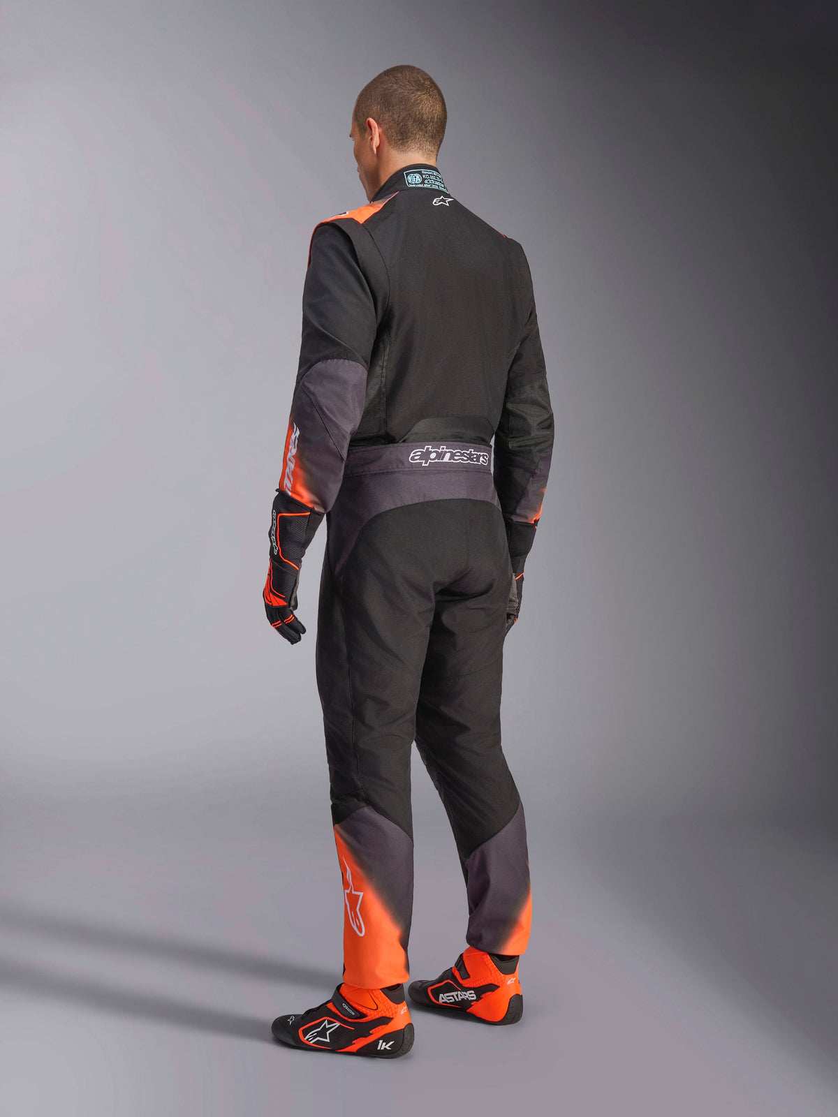 Alpinestars KMX-5 V3 Kombi, Kartanzug für Herren, Rückansicht in Schwarz und Orange Fluo, FIA 8877-2022 Grad 1 zertifiziert