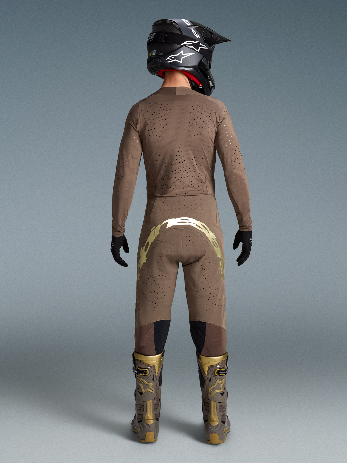 Alpinestars Limited Edition Supertech Air Gold Trikot für Herren, Motocross-Ausrüstung in Braun und Gold mit belüftetem Mesh.