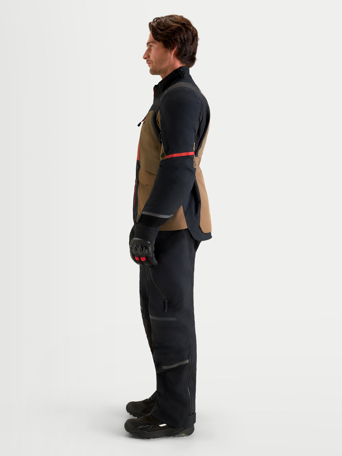 Alpinestars St-7 V2 2L Gore-Tex Jacket, Men's Adventure Touring Motorcycle Jacket, Walnut and Black, featuring CE Level 2 protection and waterproof GORE-TEX construction worn by a model in profile view