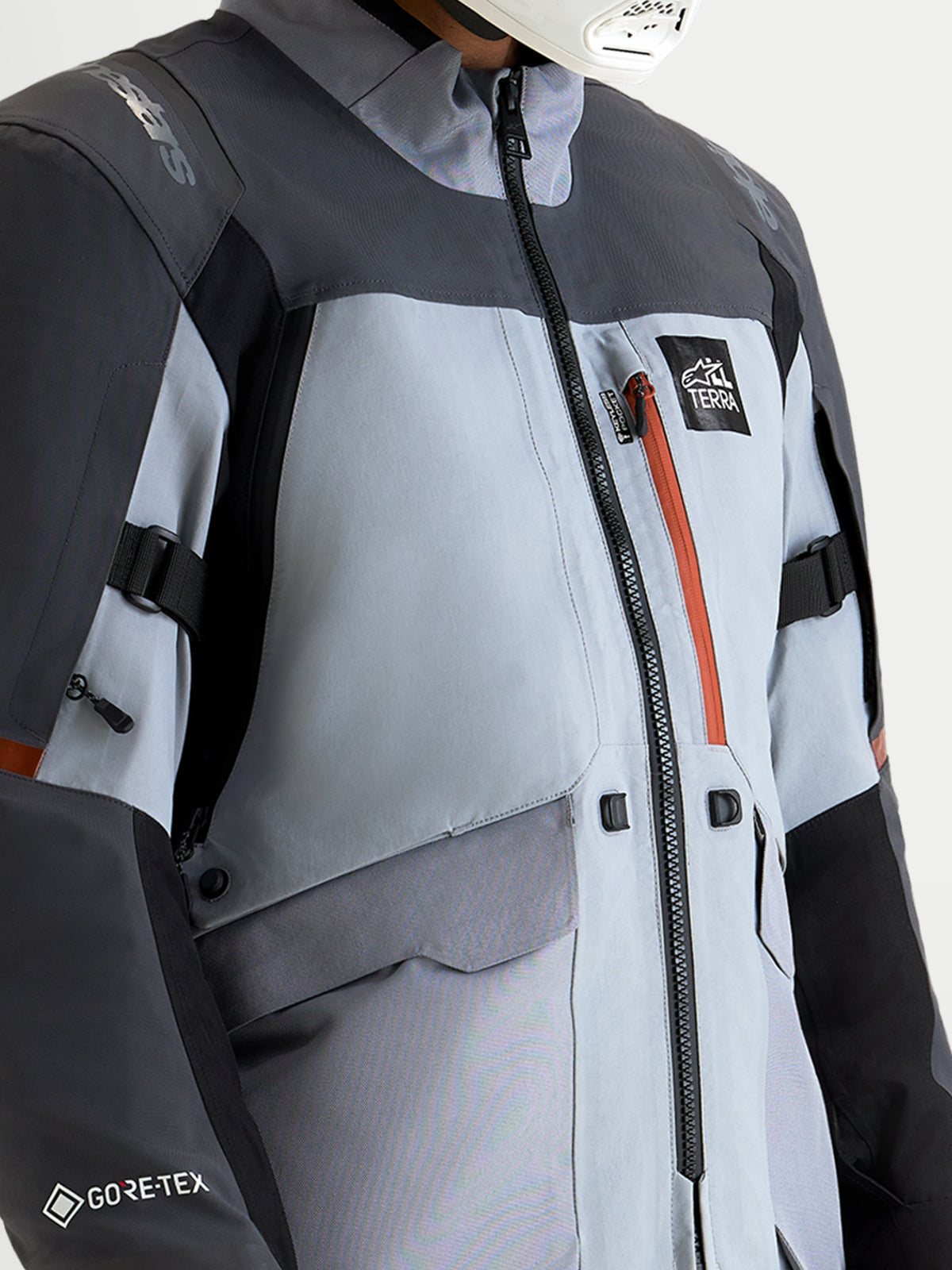 Alpinestars St-7 V2 2L Gore-Tex Jacket, Men's Adventure Touring Motorcycle Jacket, Mid Gray, Deep Gray and Black, featuring a waterproof GORE-TEX shell, direct chest ventilation, and waterproof chest pocket with orange detail