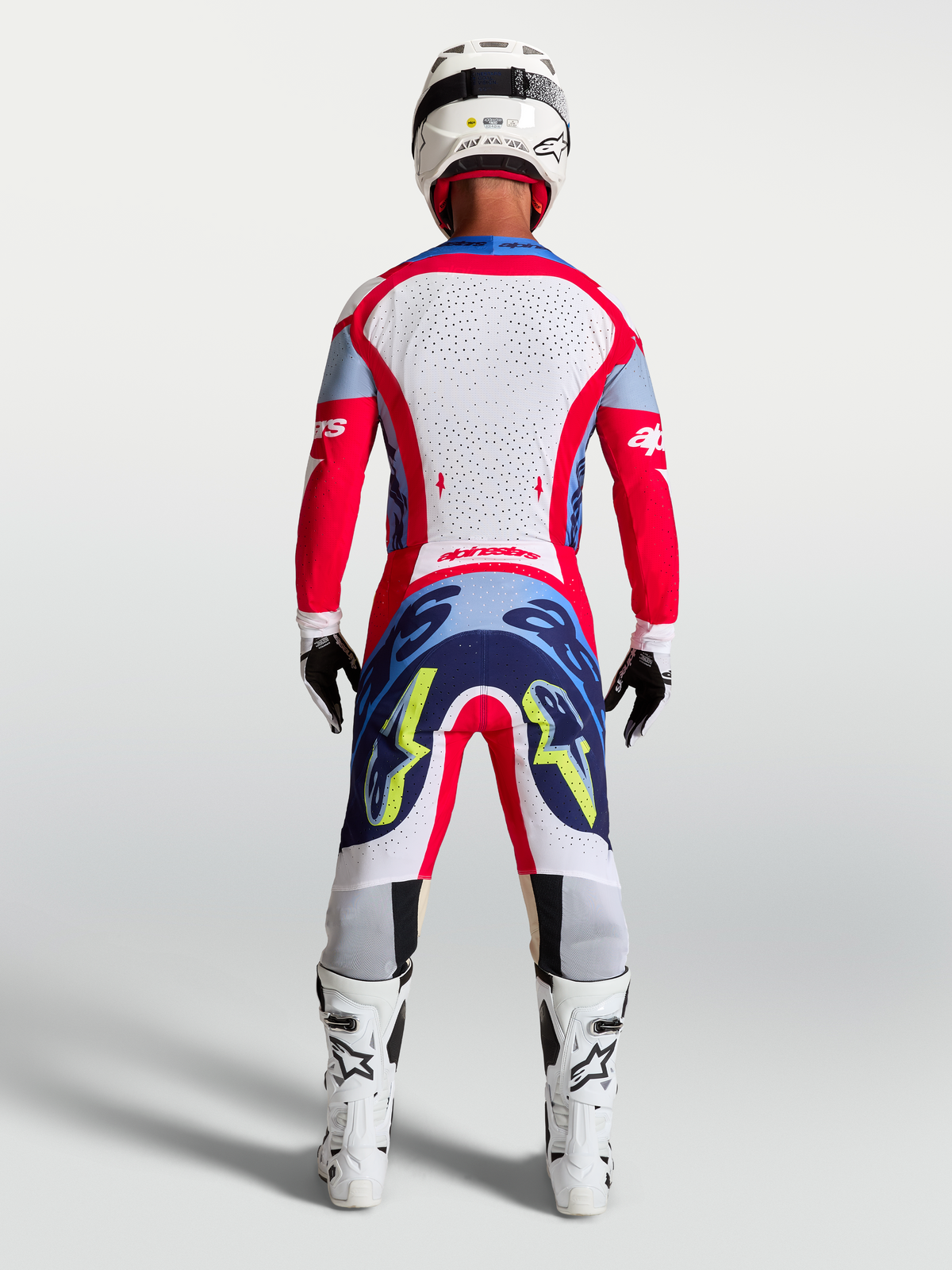 Alpinestars Supertech Dyna Hose, Motocross-Rennhose für Herren, Rot und Blau, Rückansicht auf einem Model.