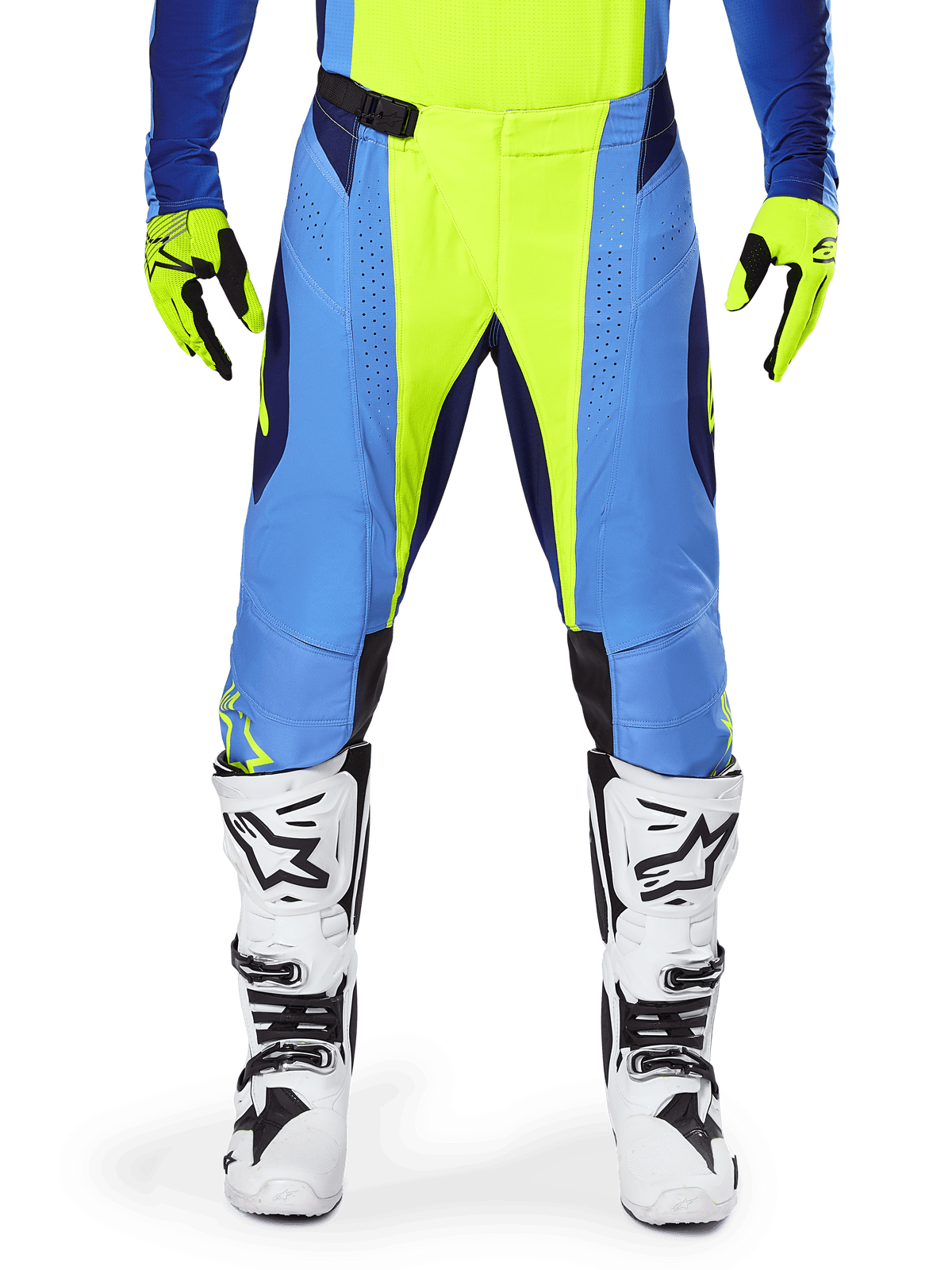 Alpinestars 2025 Techstar Melt Pants, Motocross Pants, Yellow Fluo Blue, worn with matching jersey, yellow gloves, and white and black boots, featuring a multi-panel design with laser-cut perforations and a magnetic waist buckle for professional off-road racing.