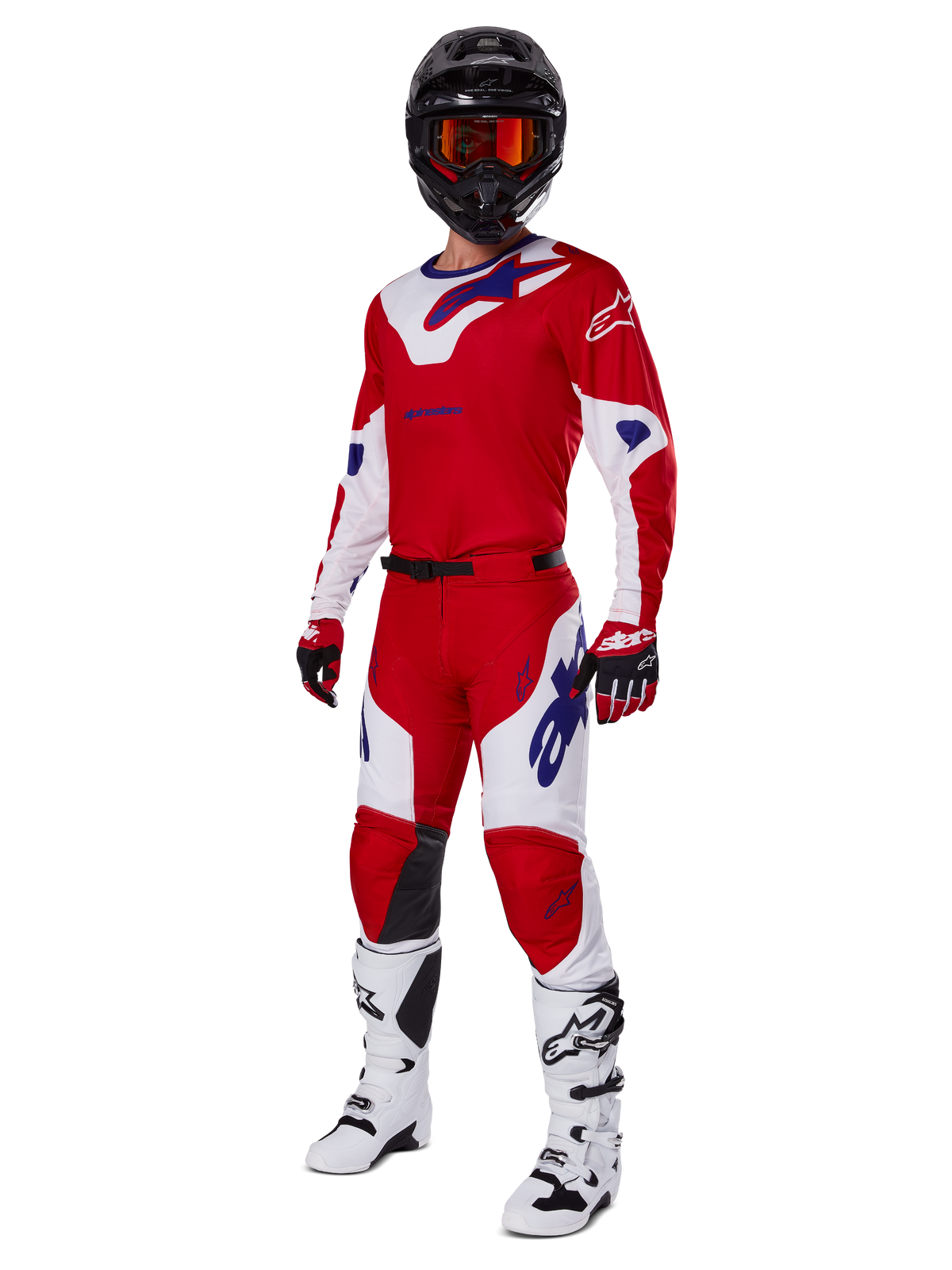 Alpinestars 2025 Racer Veil Pants, Motocross Pants, Bright Red and White, worn as part of a complete racing gear set including a matching red and white jersey, black helmet with orange goggles, white boots, and red gloves, featuring bold blue Alpinestars logos.