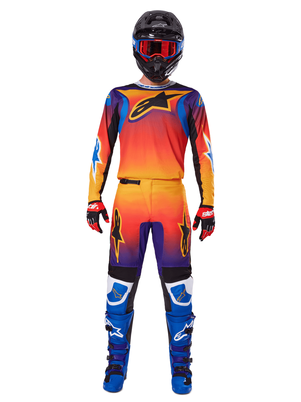 Alpinestars 2025 Fluid Wurx Hose, Motocross-Hose, mehrfarbiger Farbverlauf in Orange, Gelb und Lila, getragen mit passendem Trikot, schwarzem Helm mit blauer Brille, rot-schwarzen Handschuhen und blauen Stiefeln, abgestimmte Motocross-Rennausrüstung