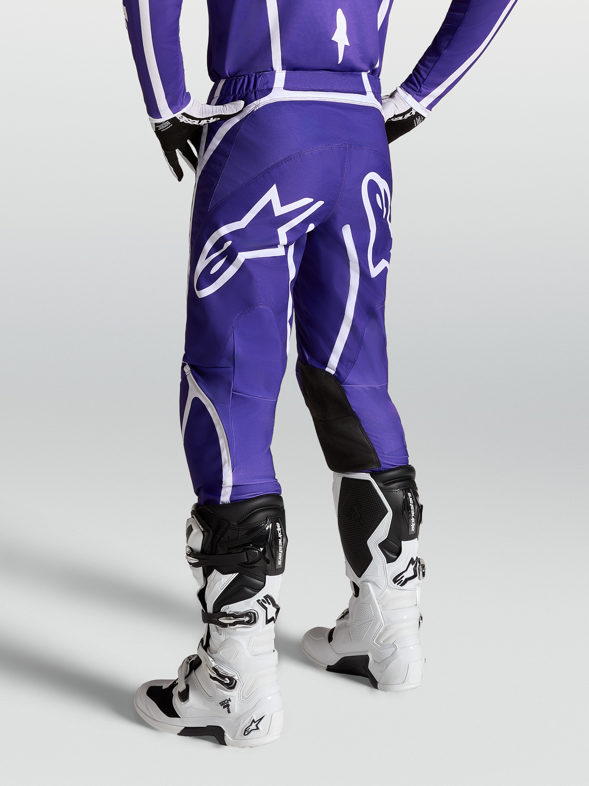 Alpinestars Fluid Apex V2 Pants, Men's Motocross Pants in Deep Blue and White, featuring a large rear star logo and ergonomic 3D cut.