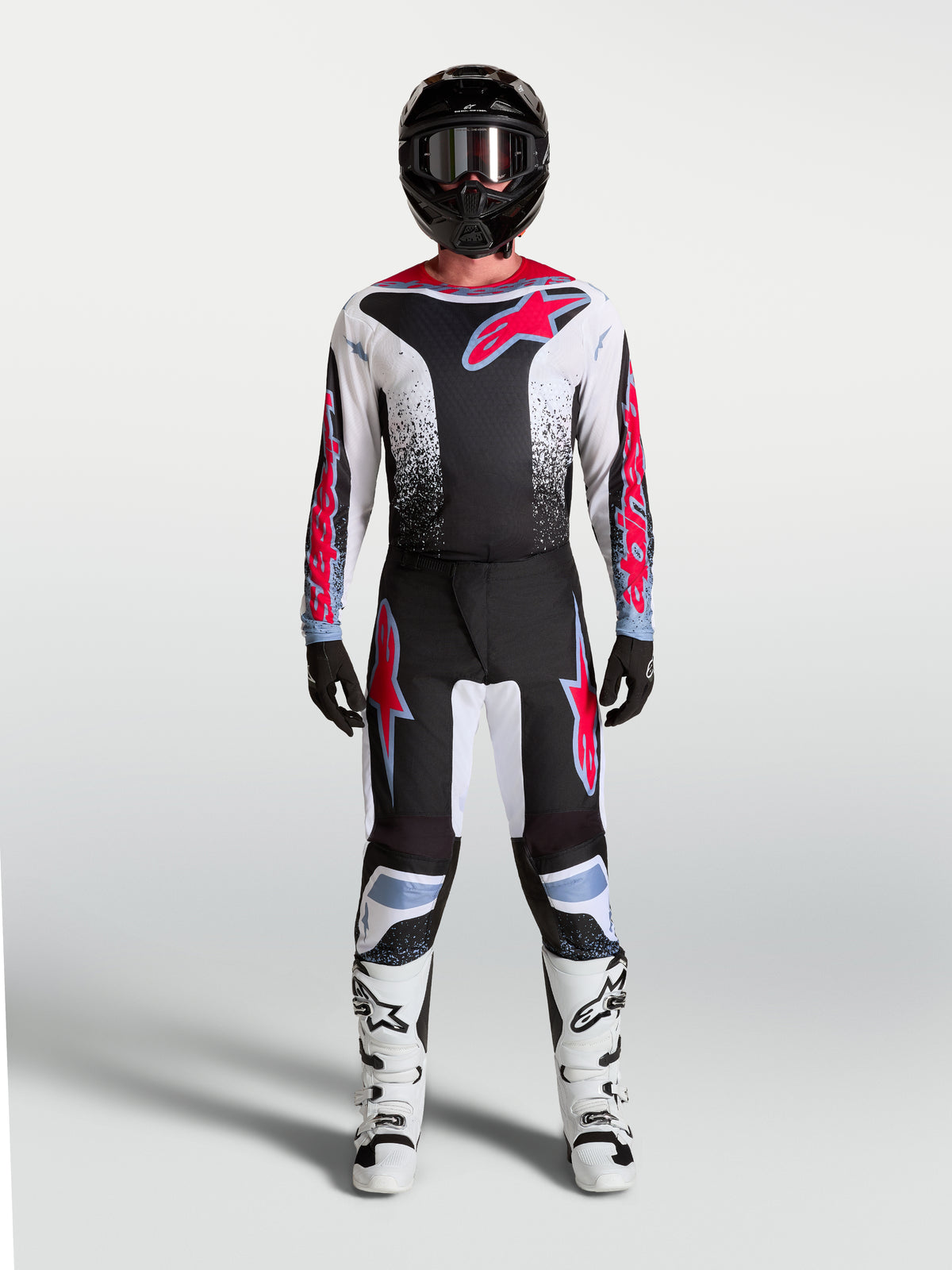 Alpinestars Fluid Drag Hose, Herren-MX-Hose in Schwarz, Weiß und Rot-Fluo mit hellblauen Akzenten, ergonomische Passform.