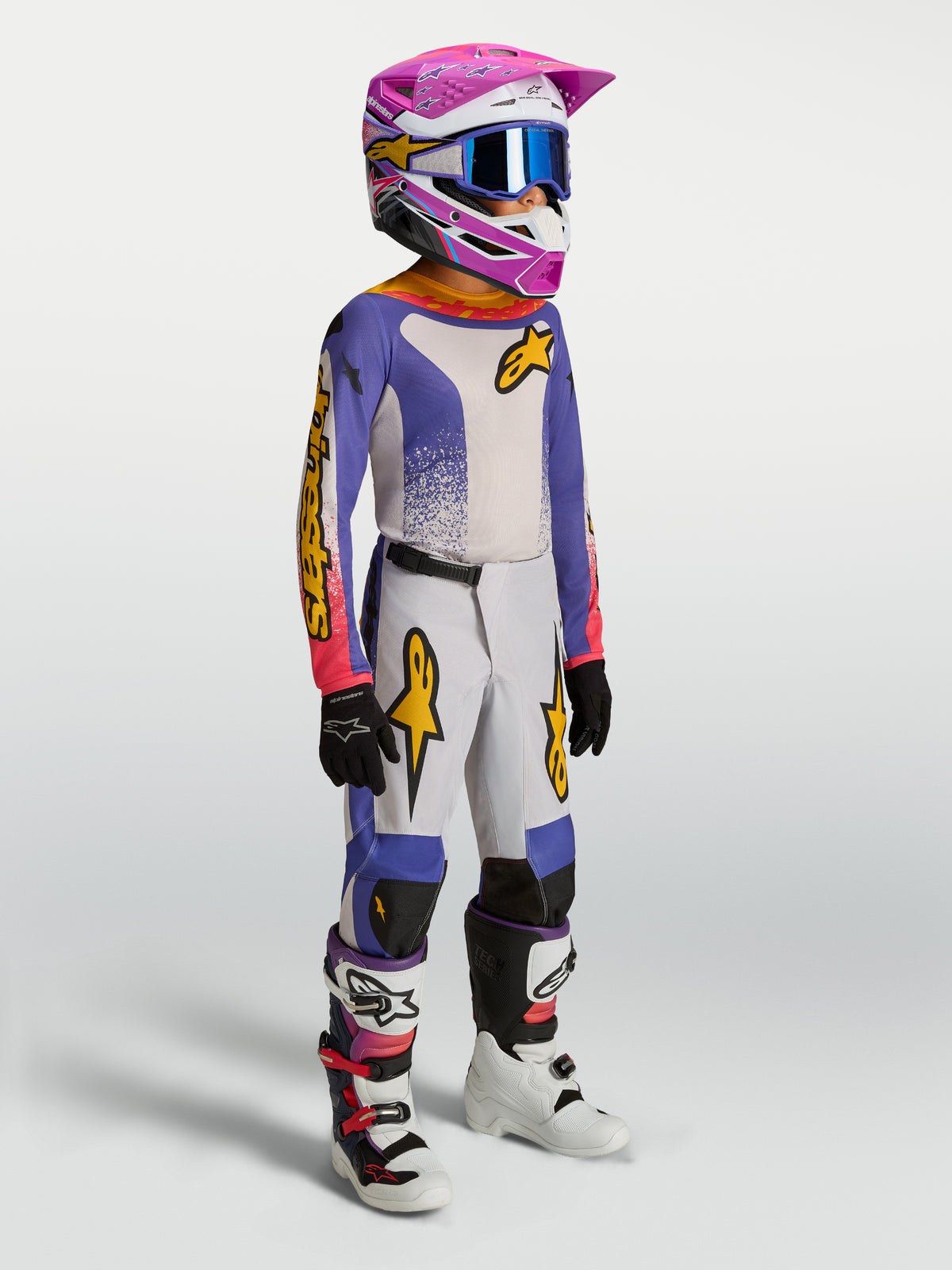 Alpinestars Fluid Drag Jugend-Hose, Blau, Gold und Grau, Motocross-Hose für junge Fahrer, ergonomisch und strapazierfähig.