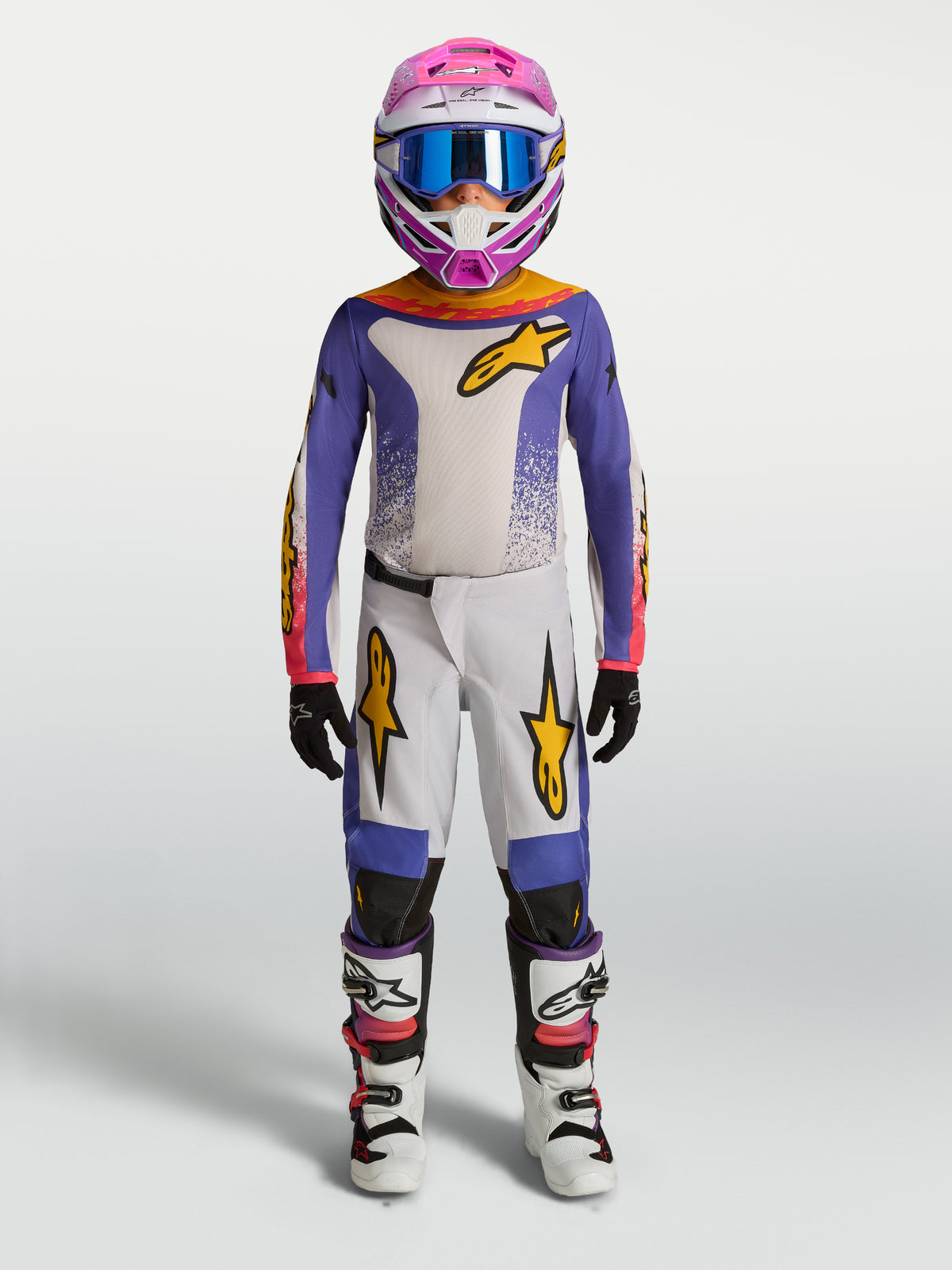 Alpinestars Fluid Drag Jugend-Hose, Motocross-Ausrüstung, Lila und Weiß, goldene Akzente, für junge Offroad-Fahrer.