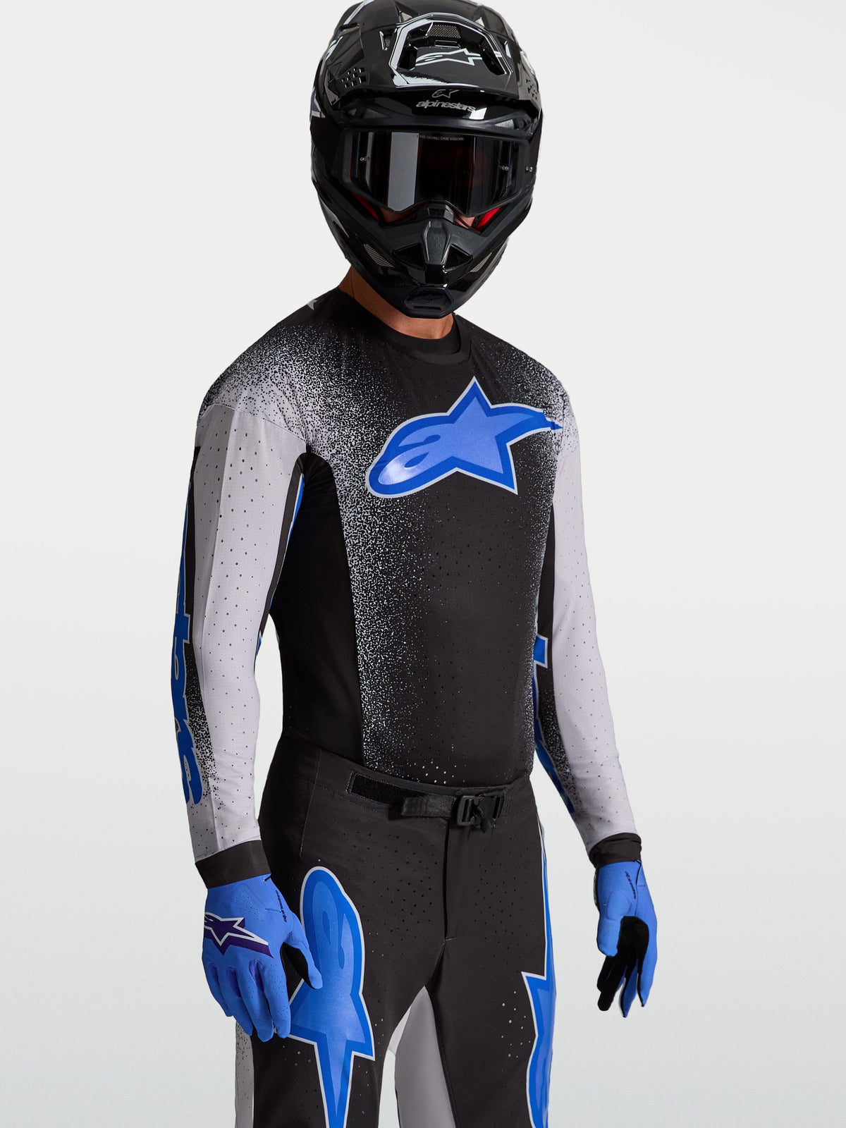 Alpinestars Supertech Hiten AFD Jersey, Motocross Racing Jersey, Men's, Black and Blue, featuring stretch mesh.