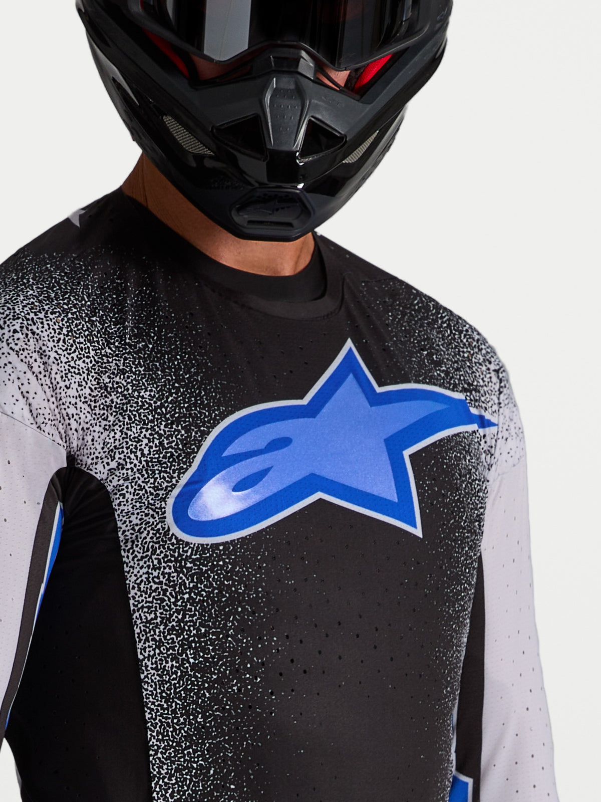Alpinestars Supertech Hiten AFD Jersey, Men's Motocross Racing Jersey in Black and Blue featuring breathable laser-cut vents.