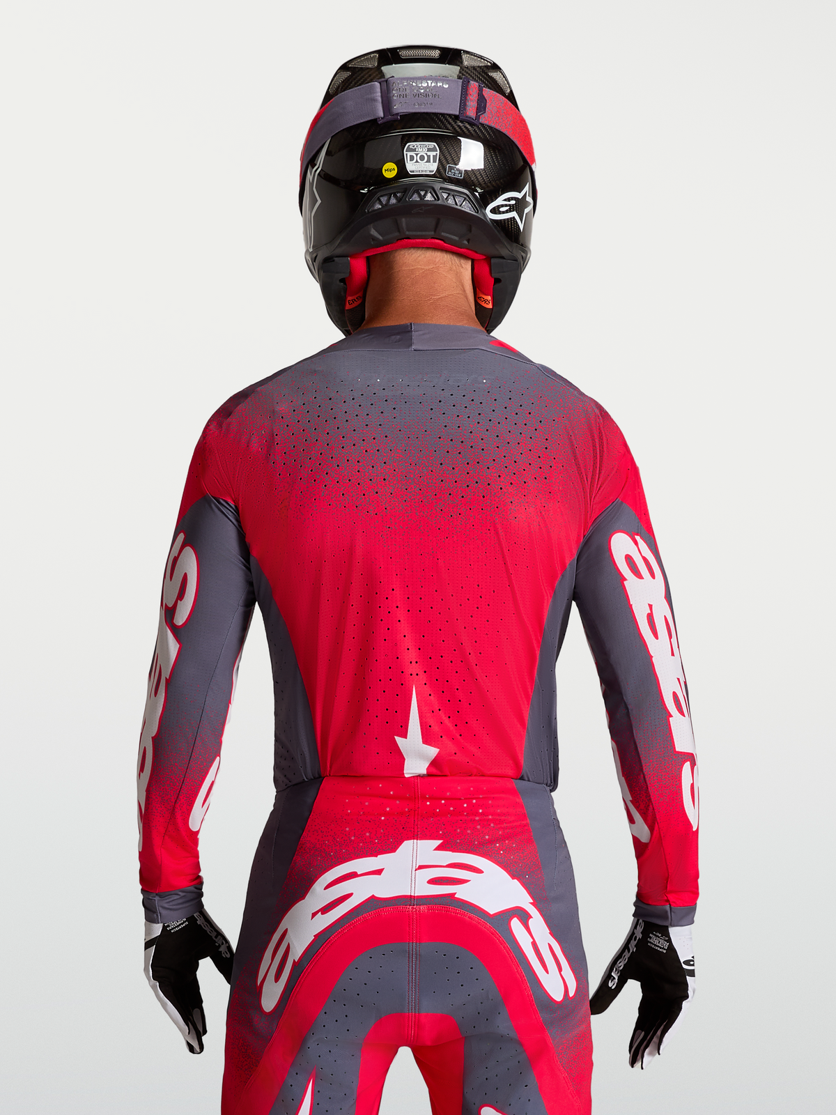 Alpinestars Supertech Hiten AFD Trikot, Motocross-Rennsport, Rückansicht, Grau und Fluo-Rot, belüftete Mesh-Konstruktion.