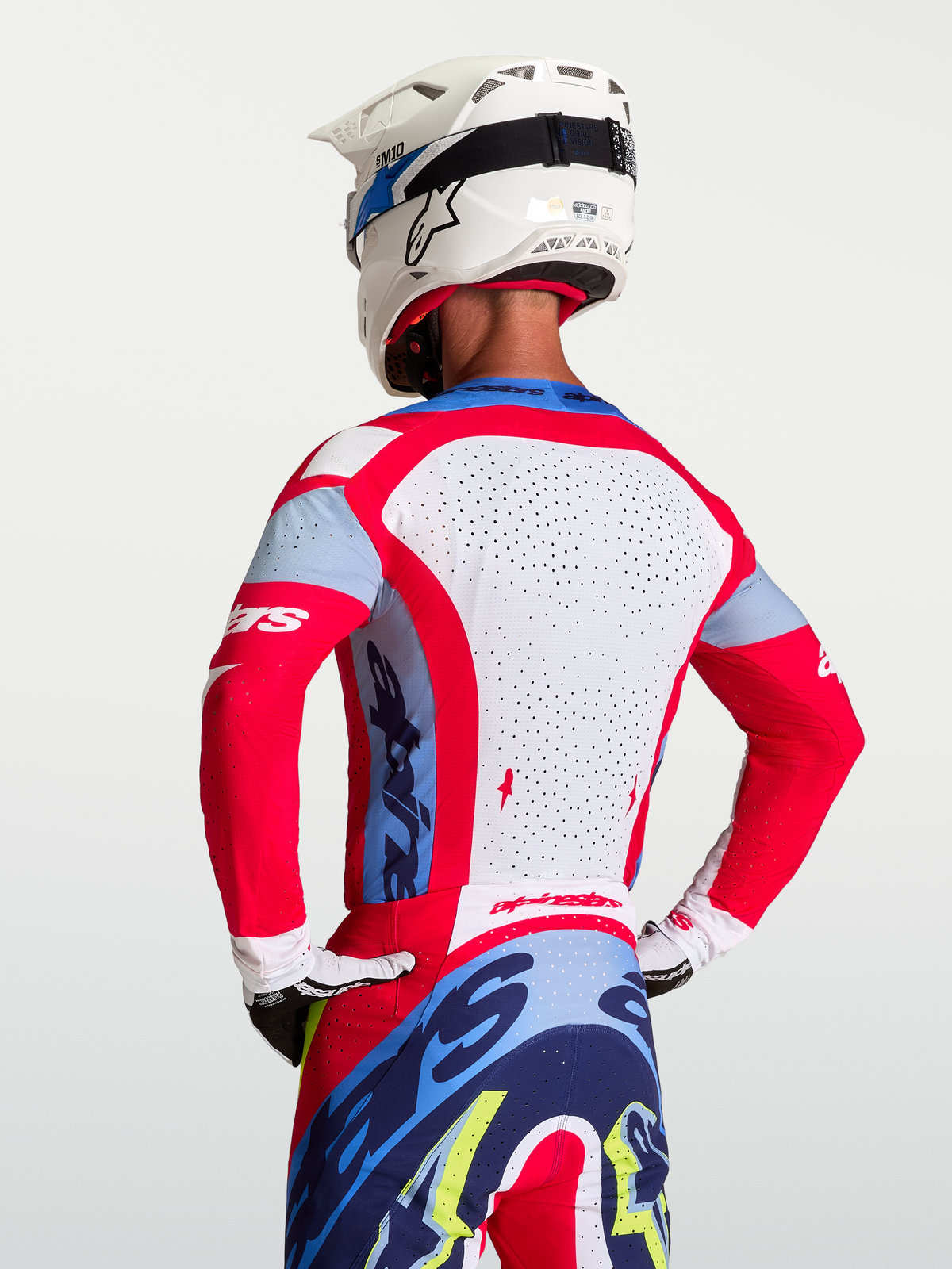 Alpinestars Supertech Dyna Trikot, Motocross-Rennsport, Rot und Weiß, mit atmungsaktivem perforiertem Mesh-Rückenteil.
