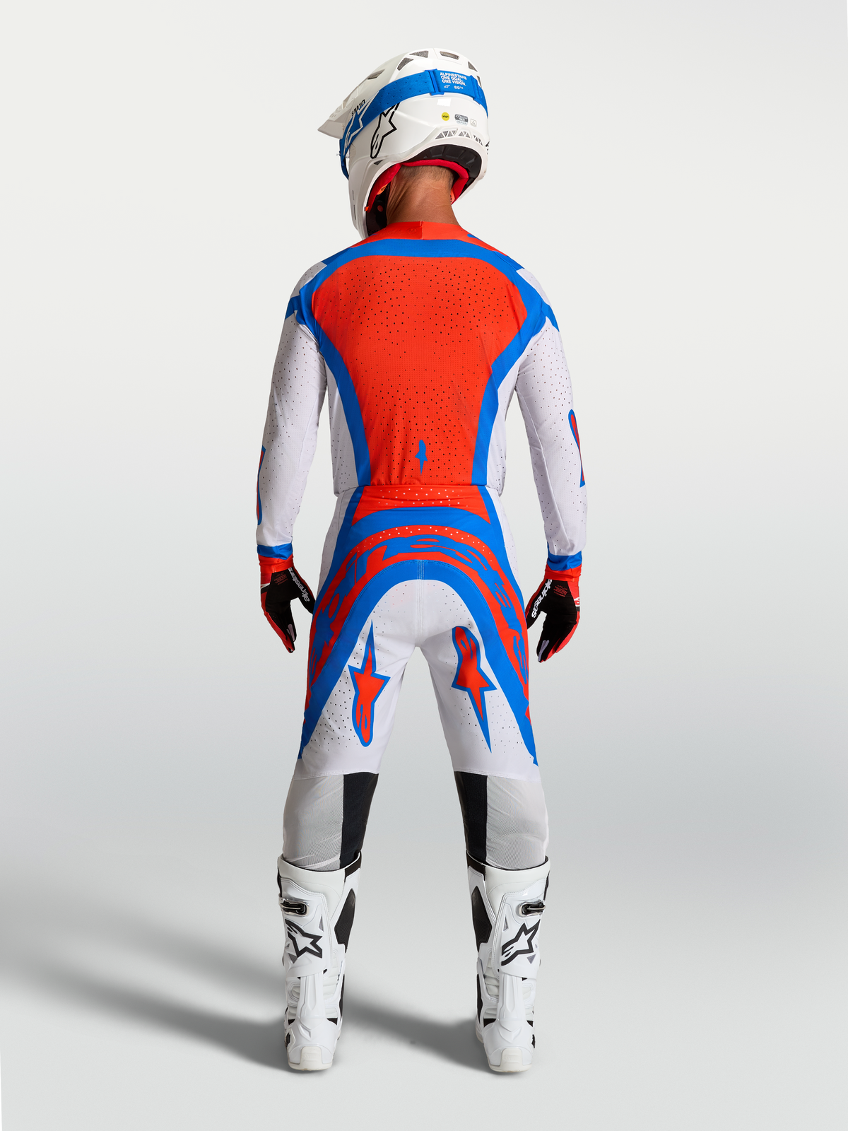 Alpinestars Supertech Vesta Ausrüstungsset, Motocross-Trikot in Rot und Blau, Rückansicht mit athletischer Herren-Passform.