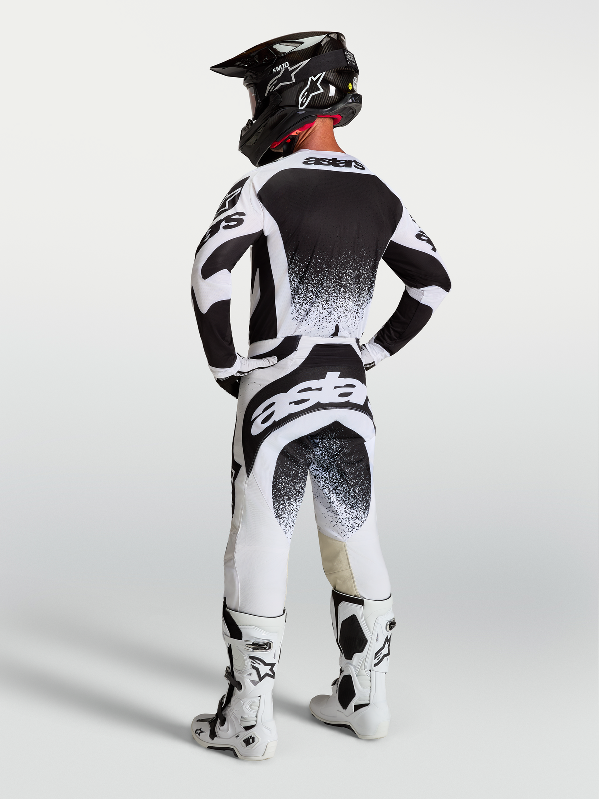 Alpinestars Techstar Swan Jersey and Gear Set, Motocross Racing Kit, Men, Black and White splatter graphics, rear view.