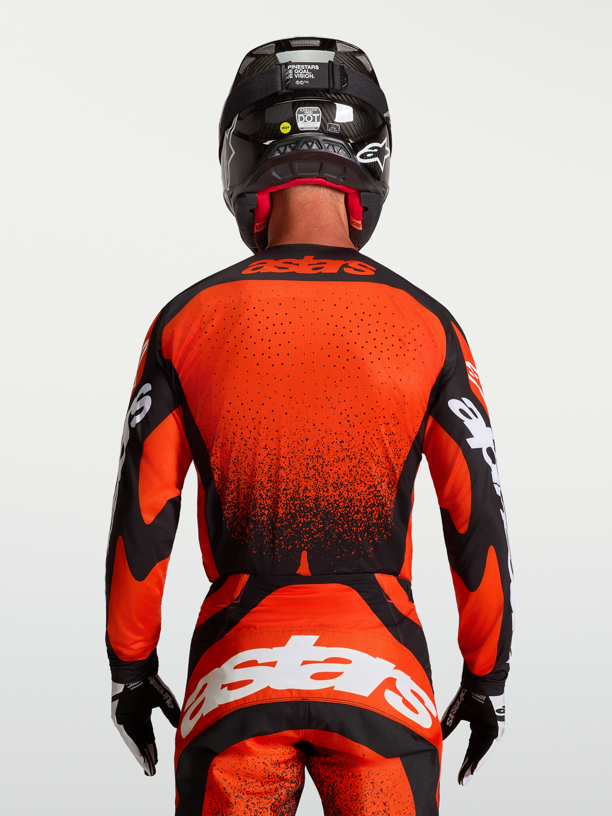 Alpinestars Techstar Swan Jersey, Red and Black Motocross Jersey, Mens On-Model Rear View, Extended Hem with Laser Perforations
