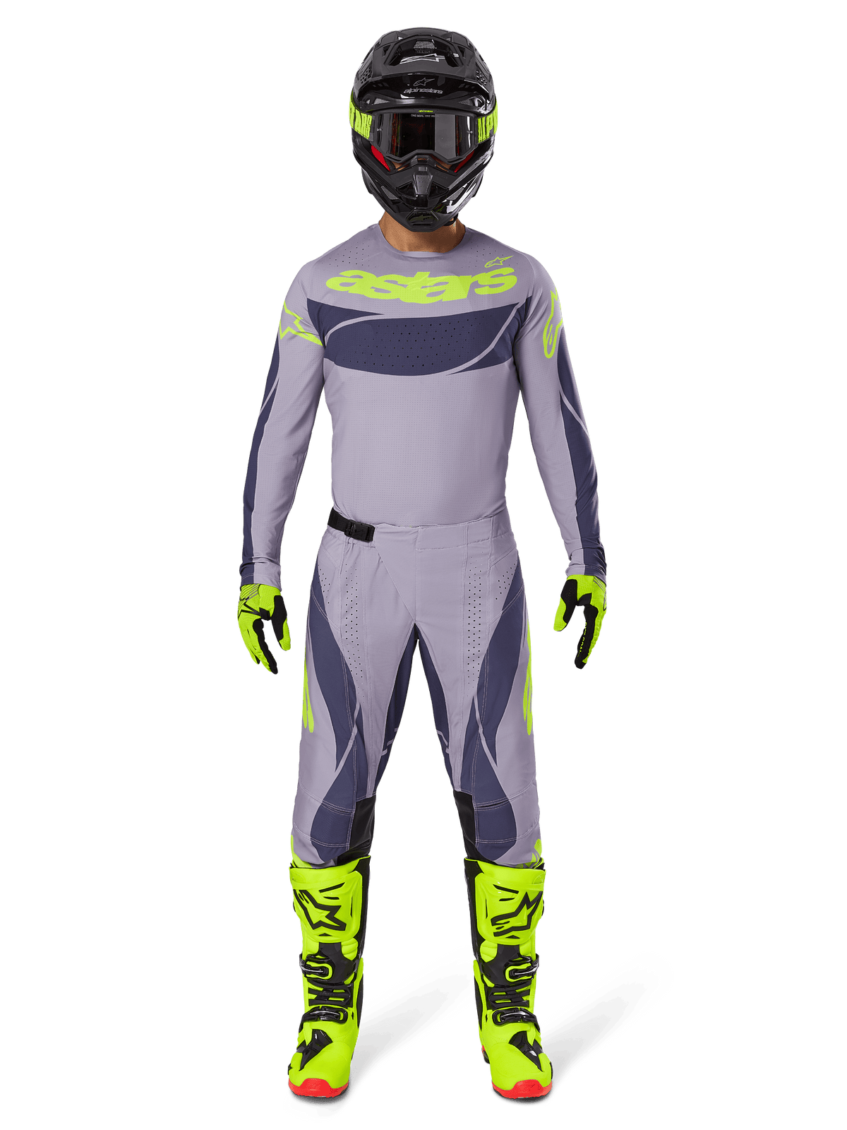 Motocross-Fahrer im Alpinestars 2025 Techstar Dreem Gear Set in Grau und Dunkelgrau mit auffälligen neongelben Akzenten, komplett mit passendem Trikot, Hose, neongelben Stiefeln und einem schwarzen Helm, entwickelt für den professionellen Offroad-Rennsport.