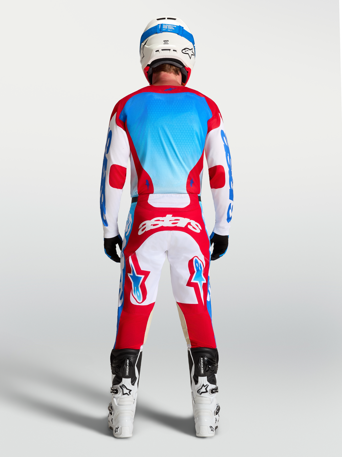 Alpinestars 2027 Racer Hunt Jersey, Men's Motocross Jersey, Rear View, White, Fire Red, and UCLA Blue moisture-wicking textile.