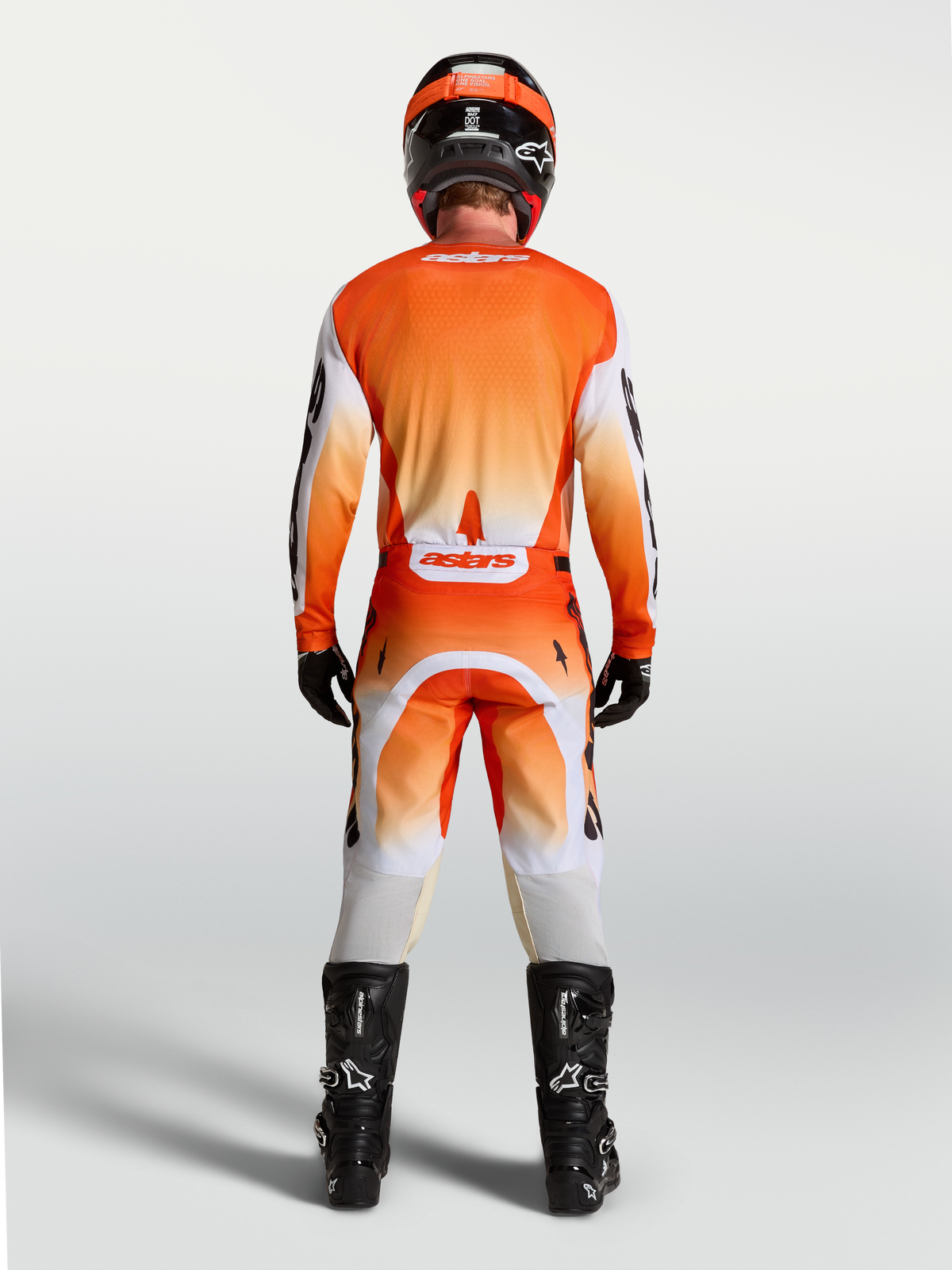 Alpinestars Racer Amber Jersey, rear view on-model, orange and white motocross jersey with breathable race fit.