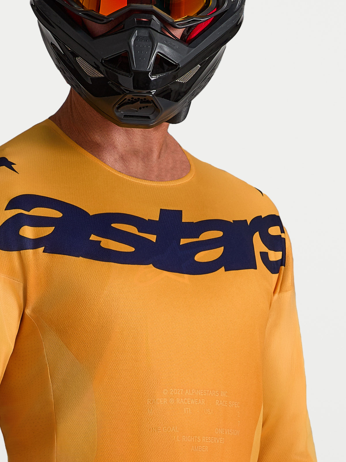 Alpinestars Racer Amber Jersey, orange and deep blue motocross jersey featuring moisture-wicking fabric and chest logo.