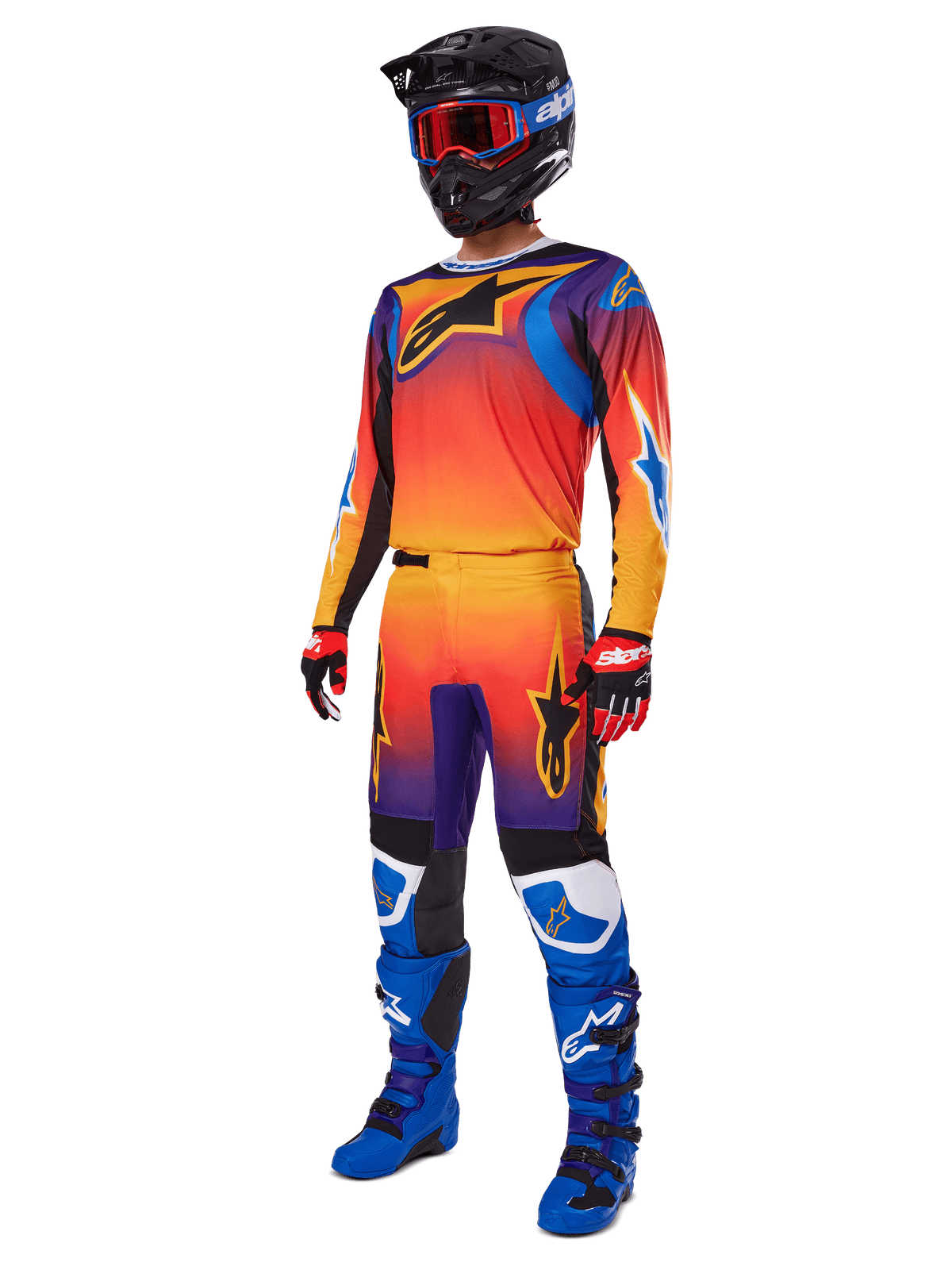2025 Fluid Wurx Gear Set, Motocross-Jersey und -Hose mit orange-rot-lila Farbverlauf und blau-gelben Sterndesigns, getragen mit schwarzem Helm, roter Brille, rot-schwarzen Handschuhen und blauen Stiefeln, hochsichtbare Rennausrüstung