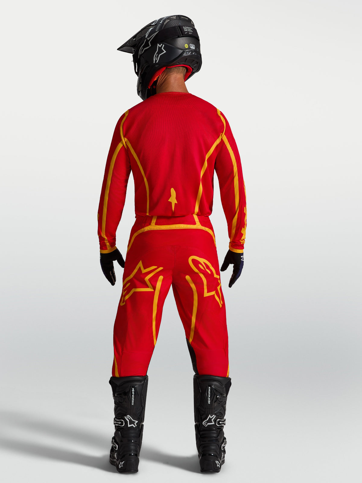 Alpinestars Fluid Apex V2 Trikot, Herren-Motocross-Trikot, Rot und Gold, leichtes feuchtigkeitsableitendes Polygewebe.